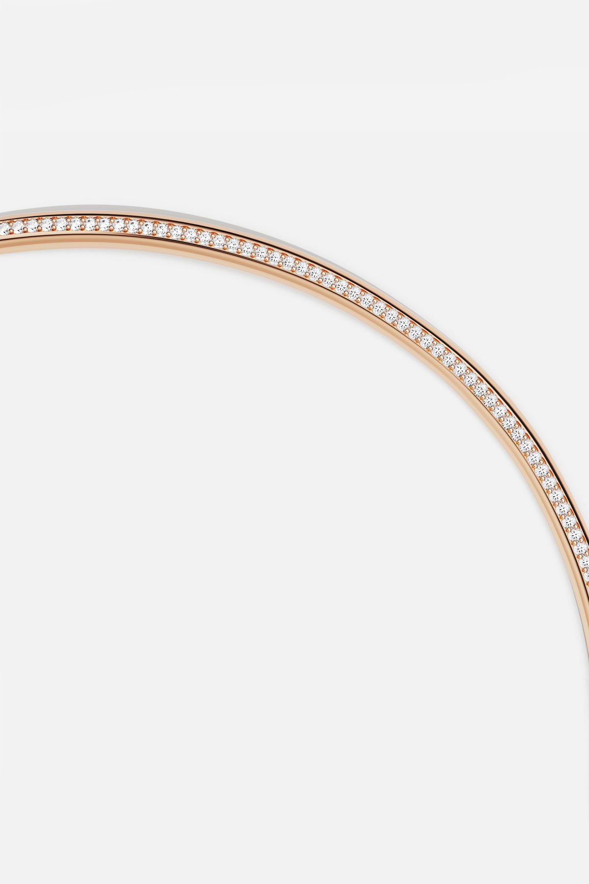 APM Monaco bangle in rose color, a delicate line of everyday brilliance.