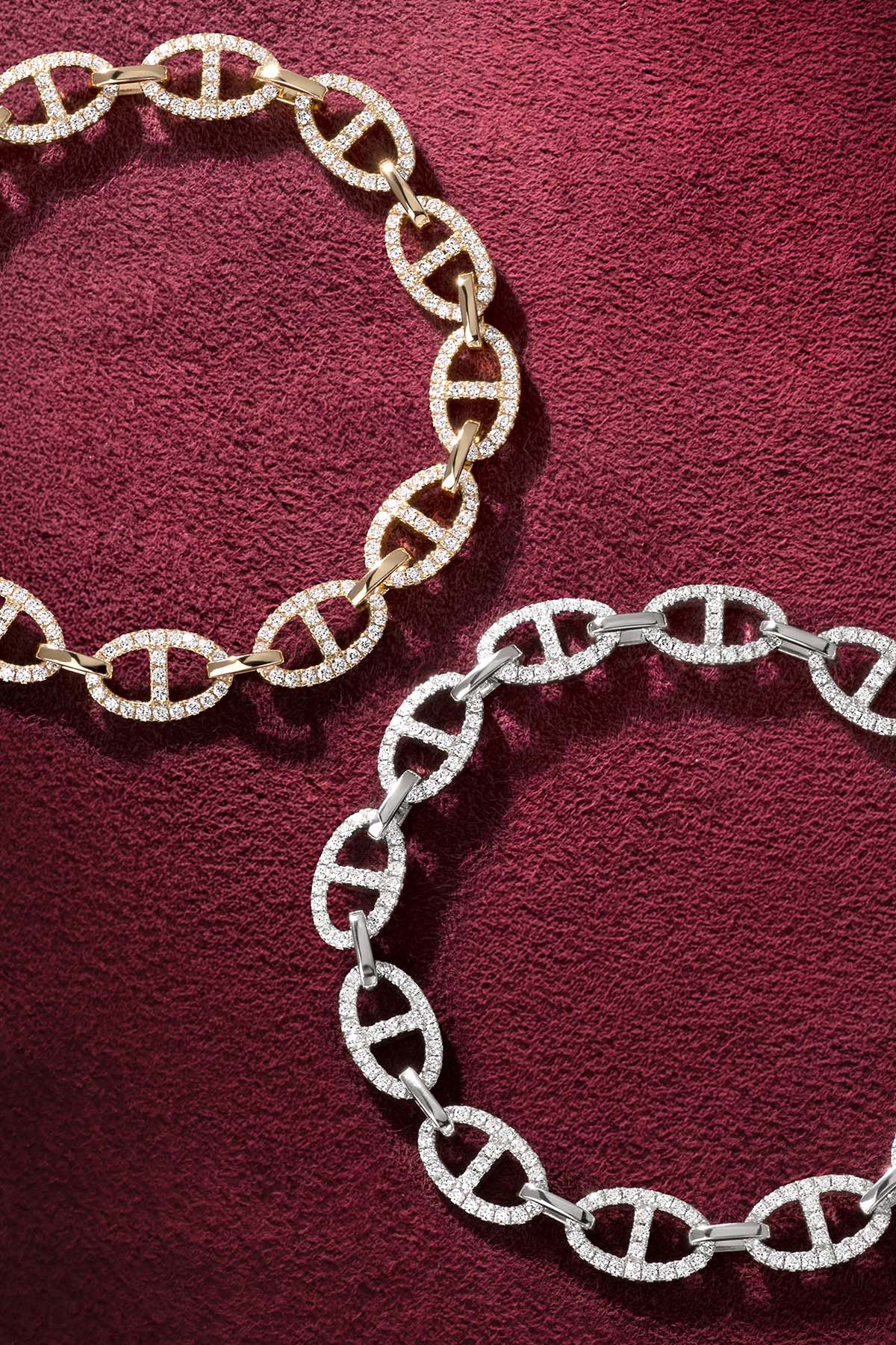 APM Bracelets in shimmering pavé links, bold elegance in two radiant colors.