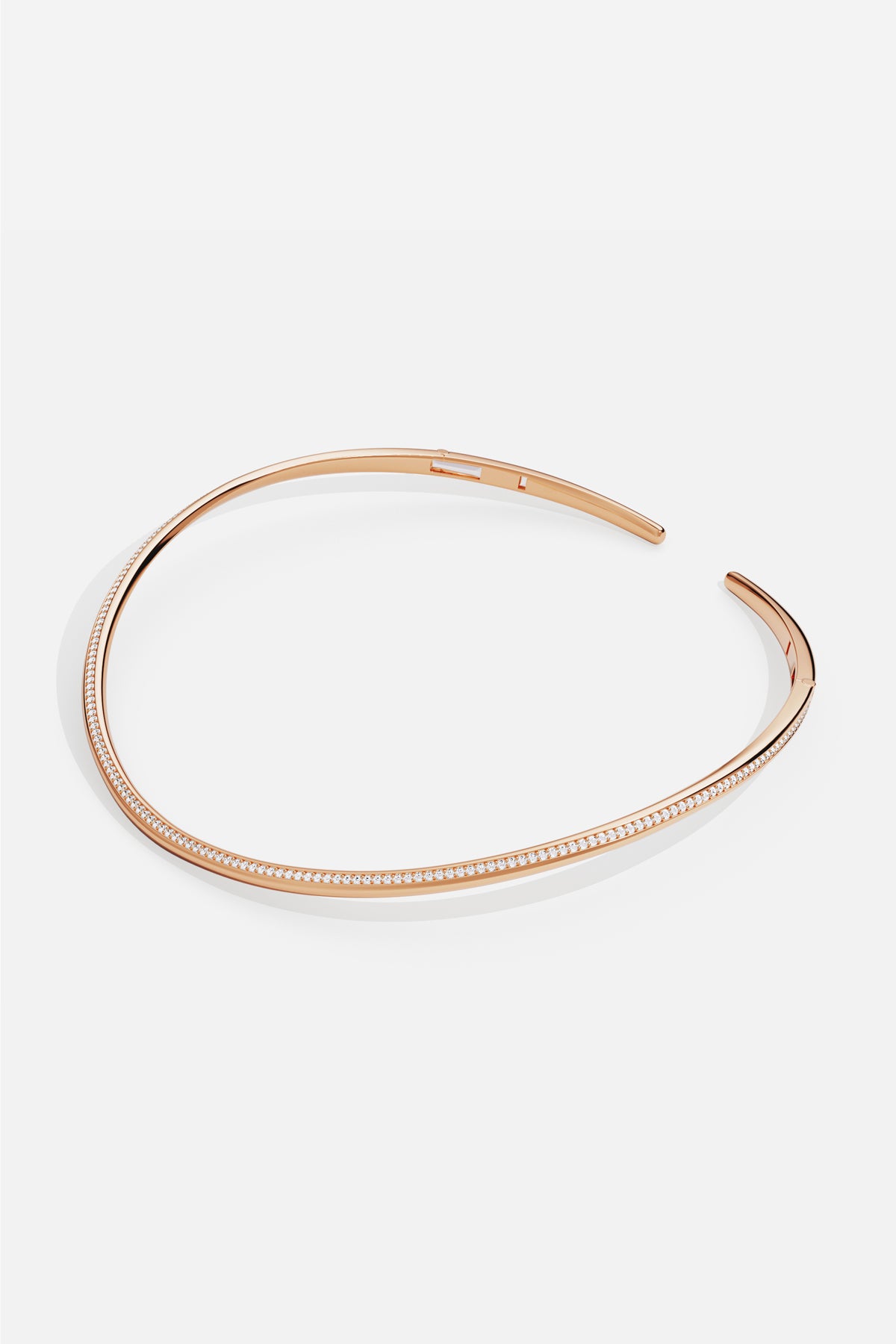 APM choker in rose color, a sleek line of quiet radiance.
