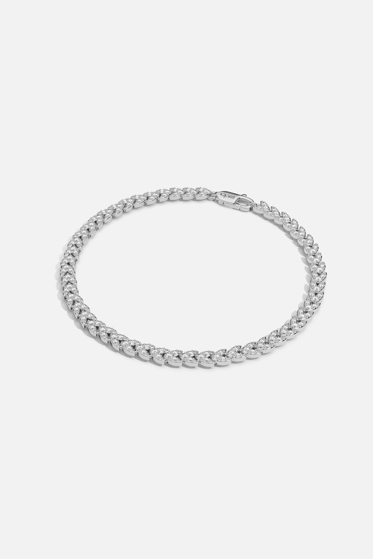 APM Necklace in rhodium finish, a shimmering curb chain radiating effortless modern elegance.