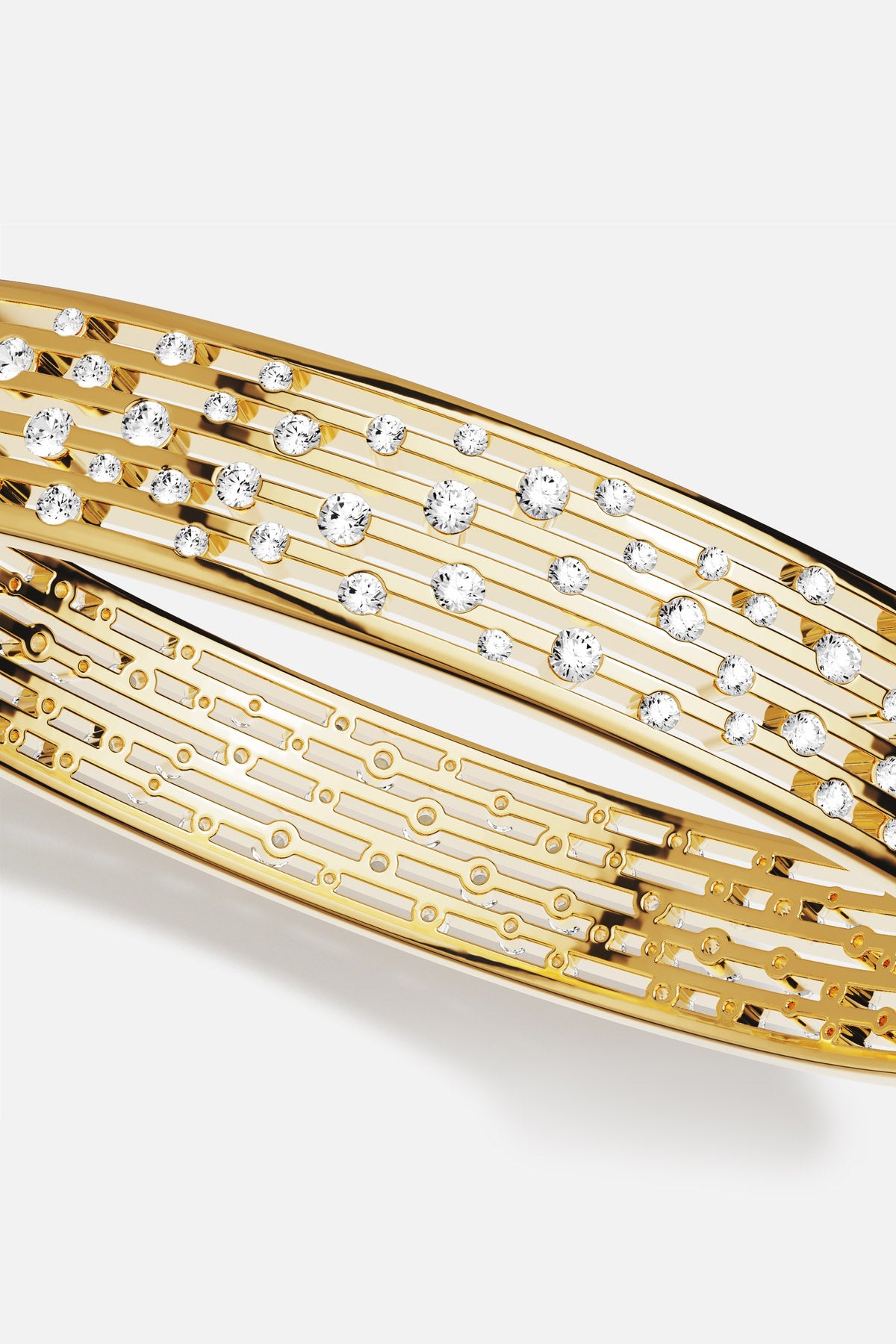 APM Bangle in golden color, shimmering with scattered stones for effortless elegance.