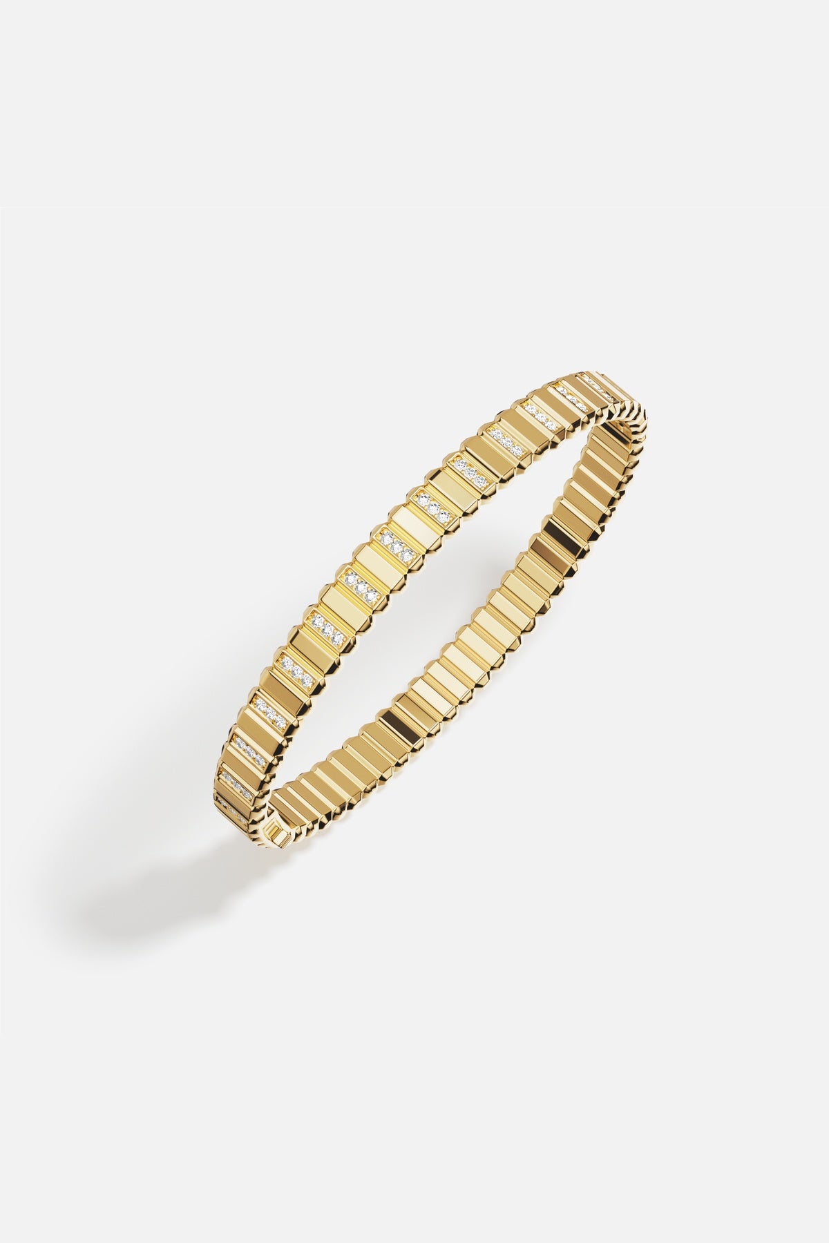 APM Bracelet in golden hues, ridged elegance meeting a subtle sparkle.