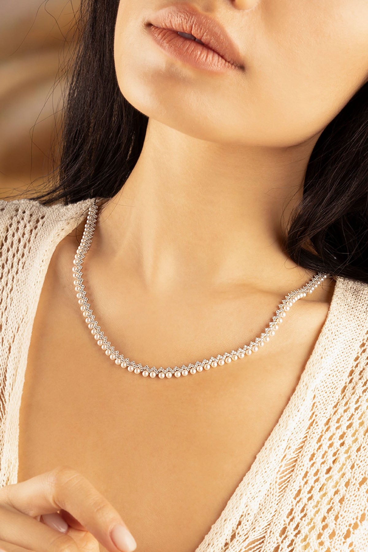APM Monaco Up and Down Adjustable Necklace with Pearls worn on neck