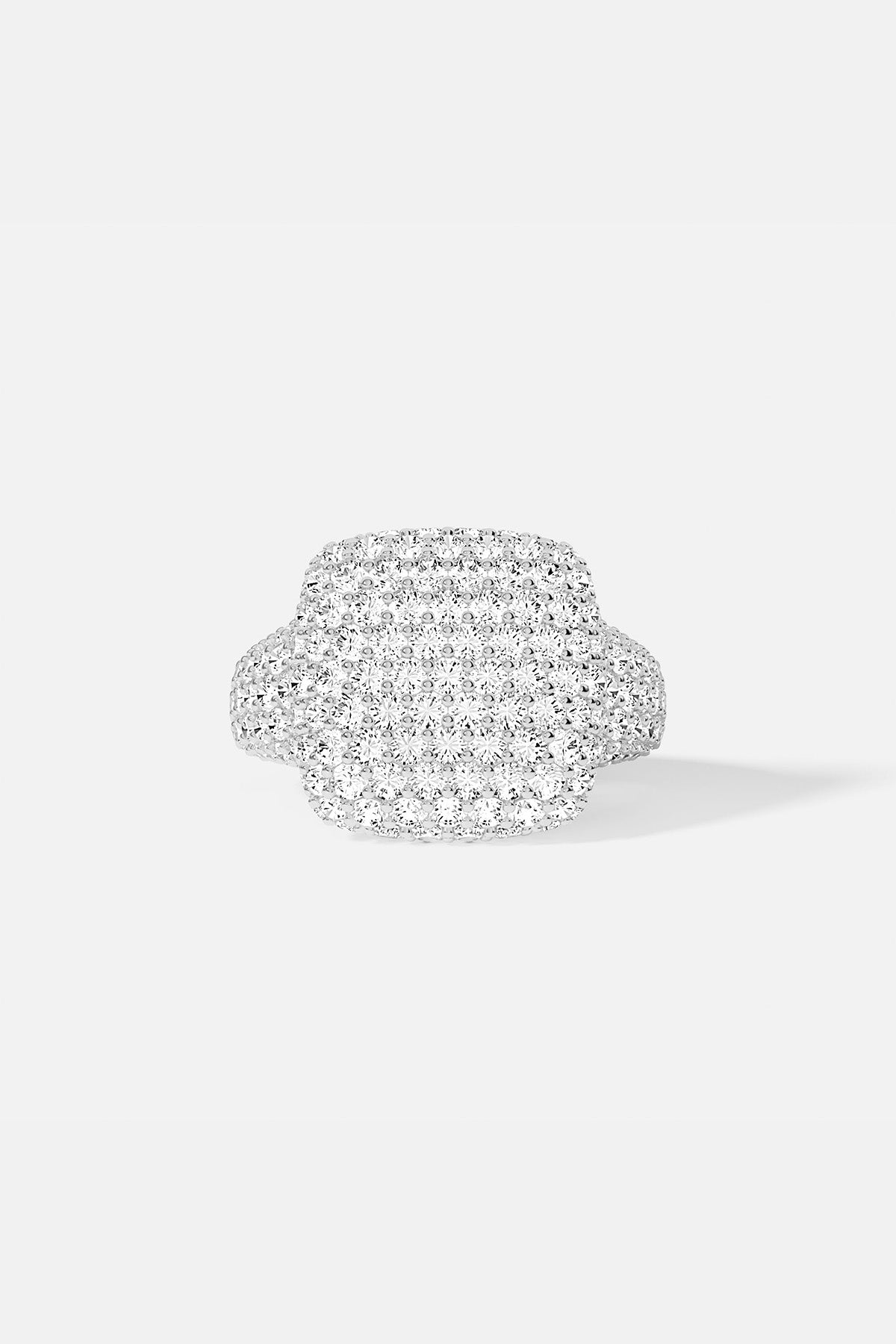 APM MONACO silver ring with embedded white stones on a light background