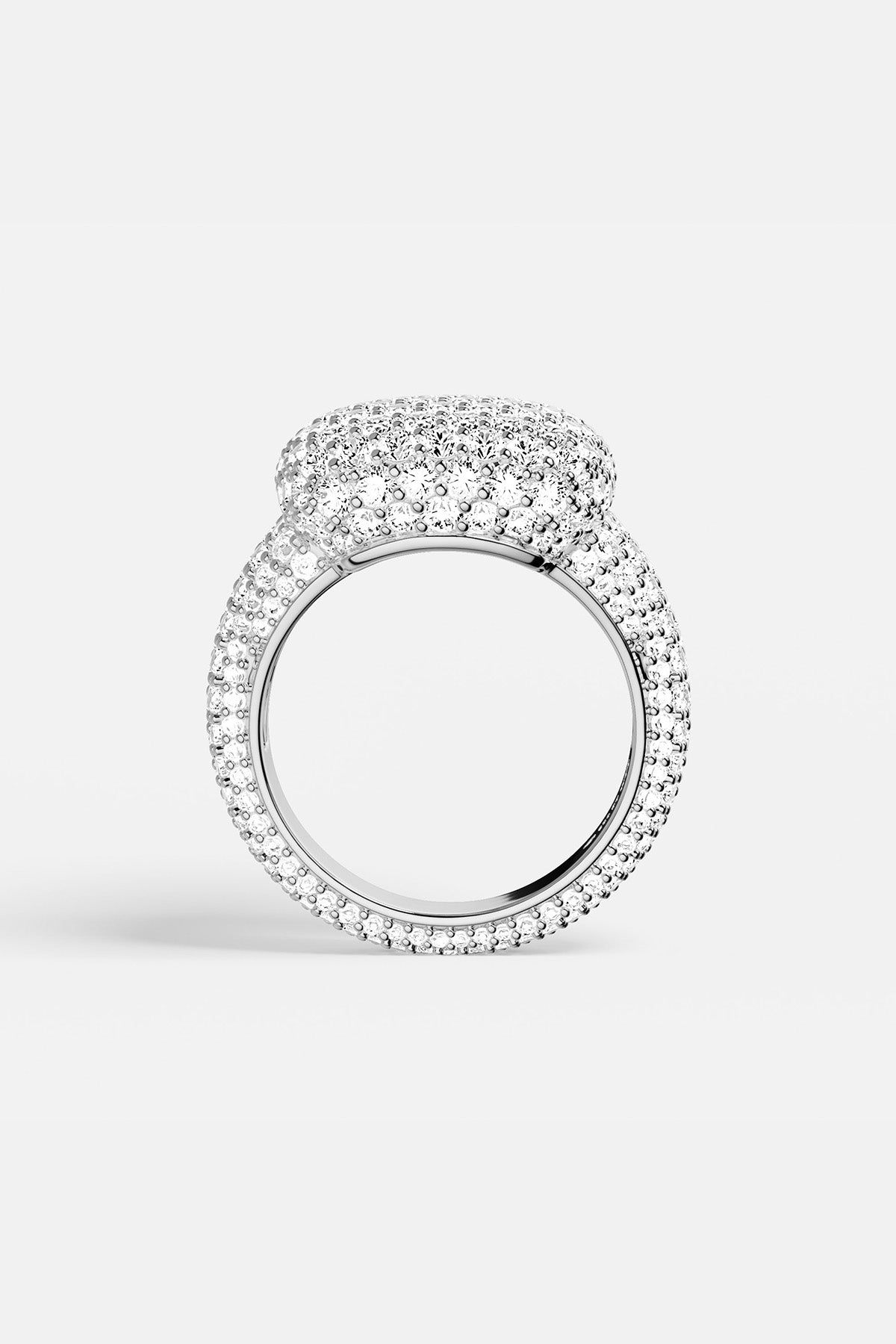 APM MONACO silver ring with embedded white stones on a light background