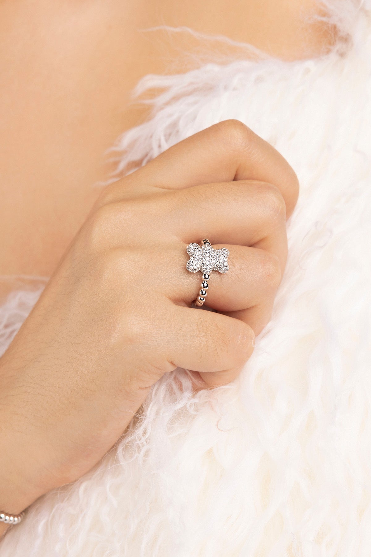 APM MONACO silver ring with baby snow yummy bear design worn on model