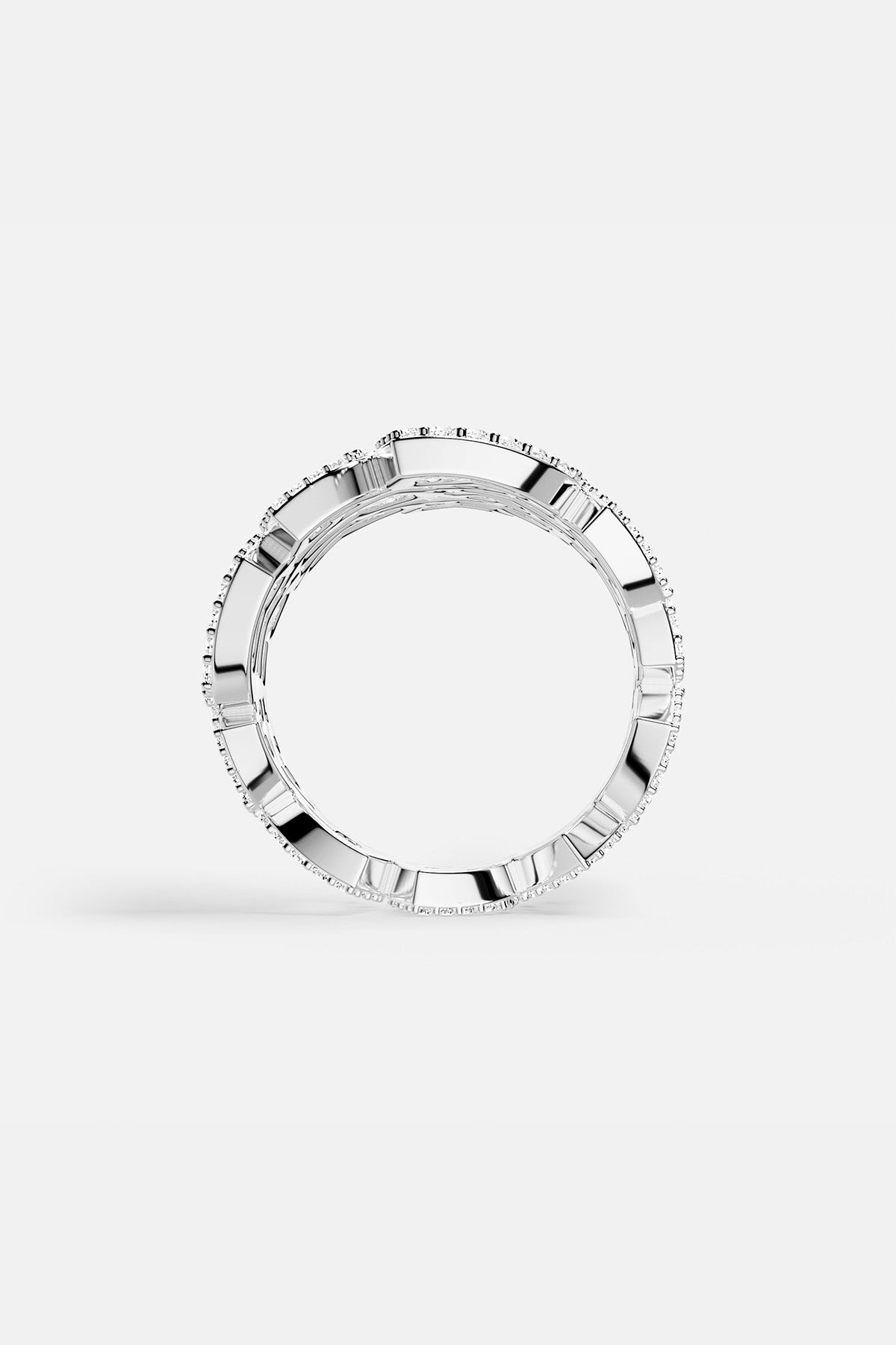 APM MONACO heart-shaped silver earring on a white background