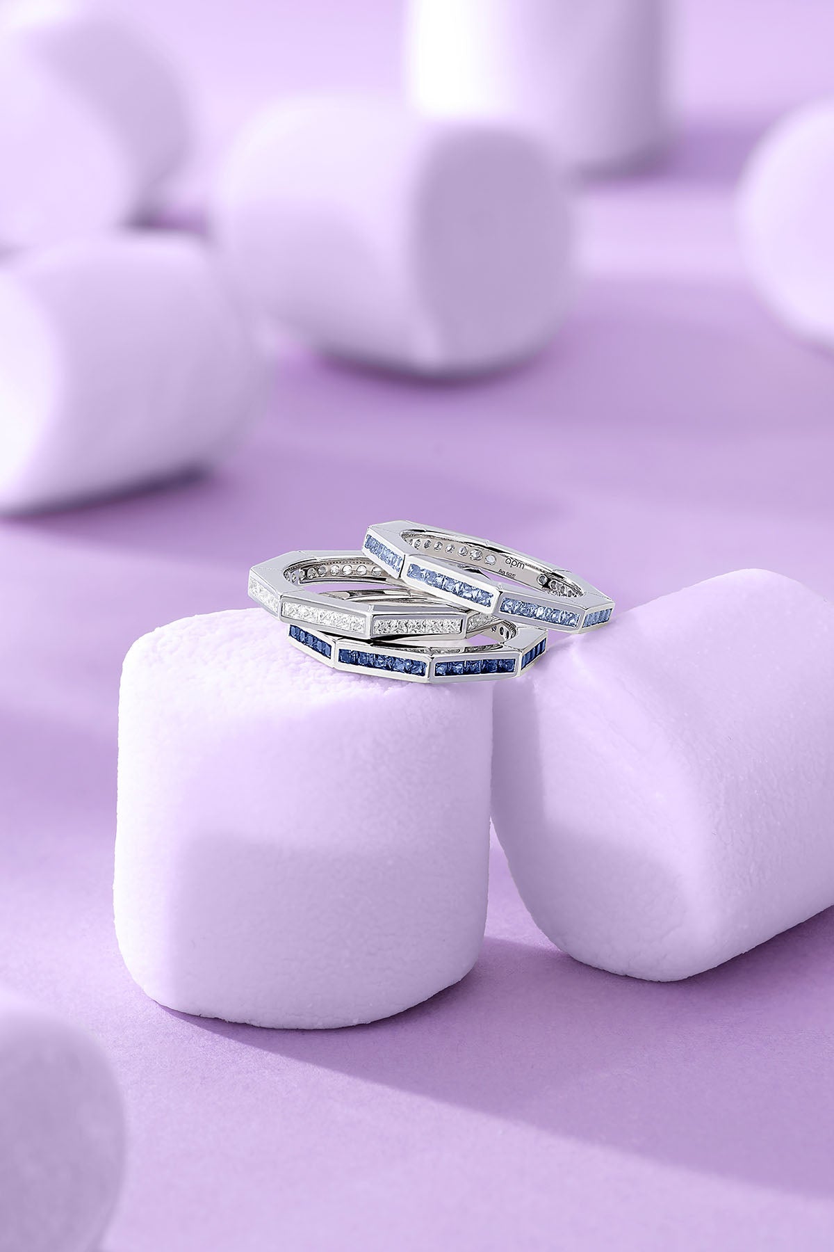 Blue Geometric Pavé Ring on a purple background