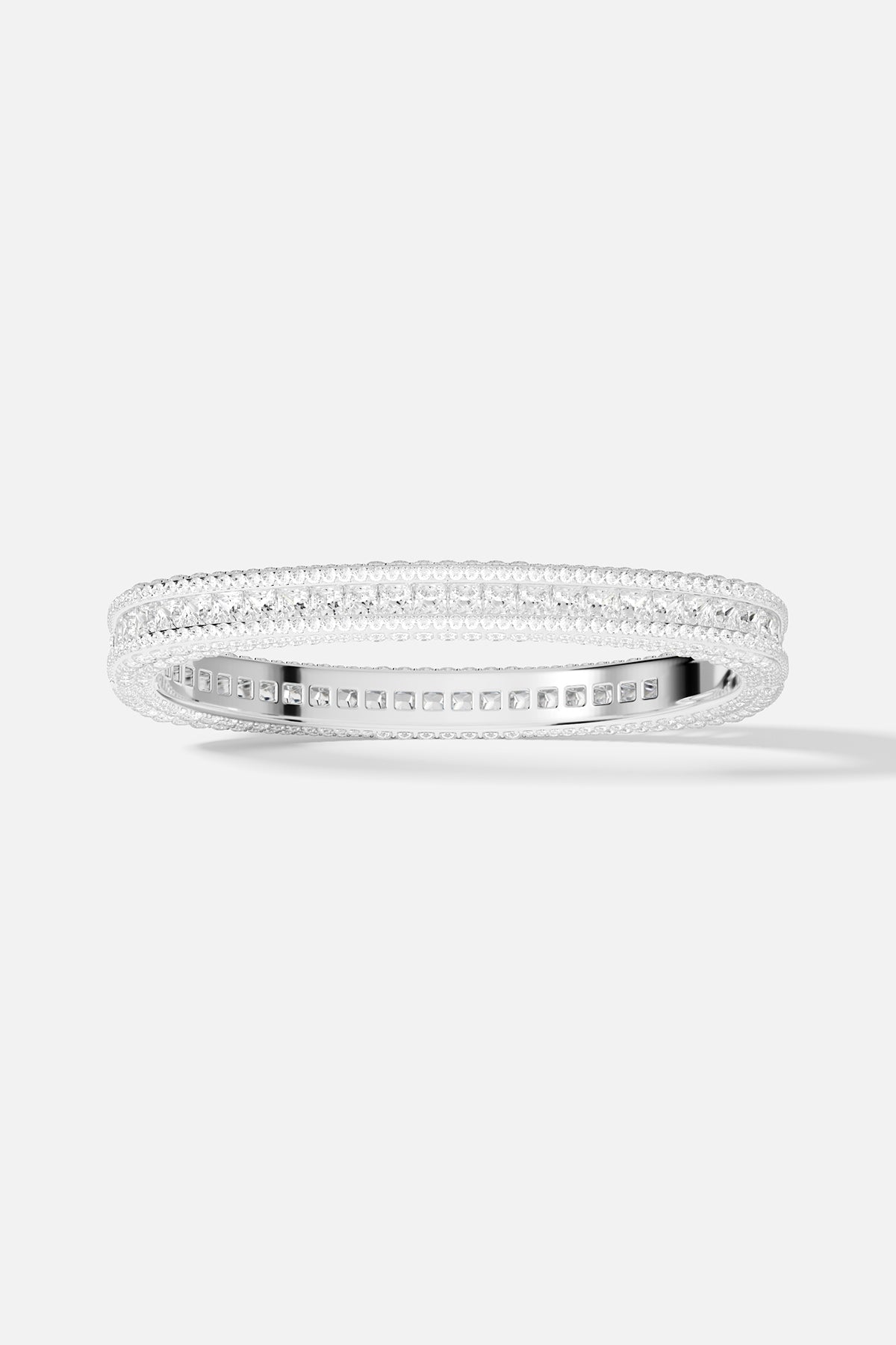 Bracelets APM Monaco pavé bangle with white diamonds set on white metal.