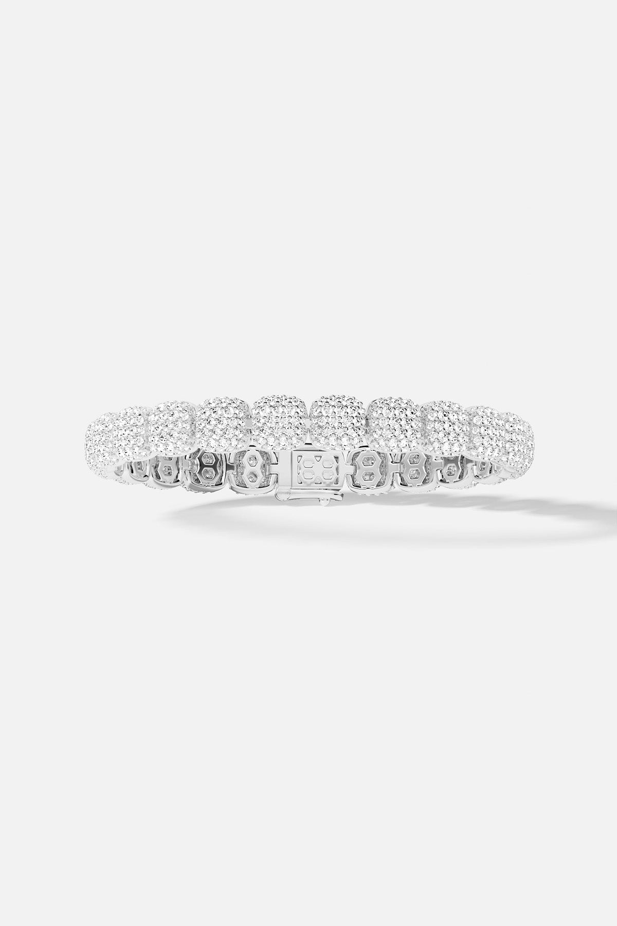 APM MONACO pave bracelet in silver with full small white stones on a light gray background