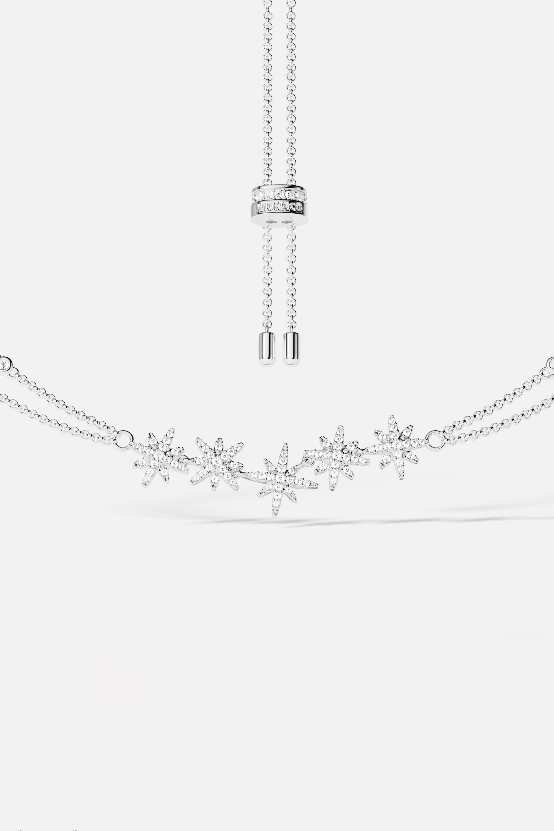 Necklaces APM Monaco. Silver-toned, double-chain adjustable necklace with a sleek, minimalist design; two parallel chains allow length adjustment for versatile styling.