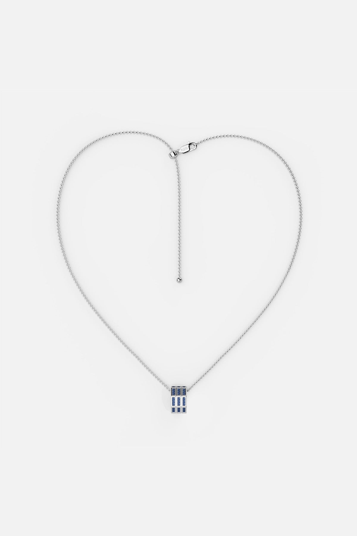 APM MONACO silver necklace with blue stones on a white background