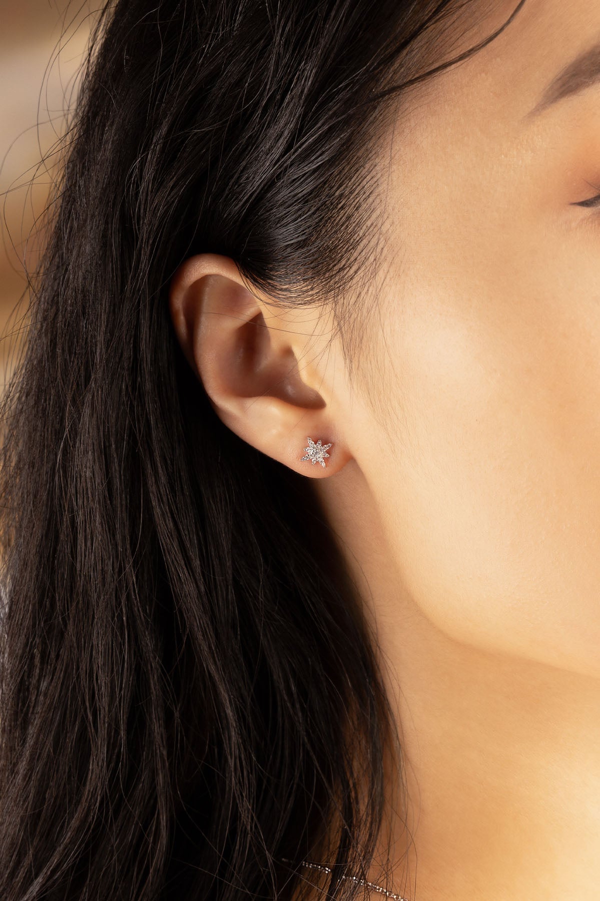 APM Monaco Mini Météorites Stud Earrings in Silver worn on ear