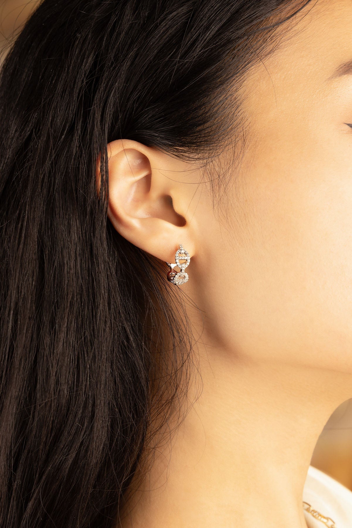 APM Monaco Maille Marine Hoop Earrings in Silver worn on ear