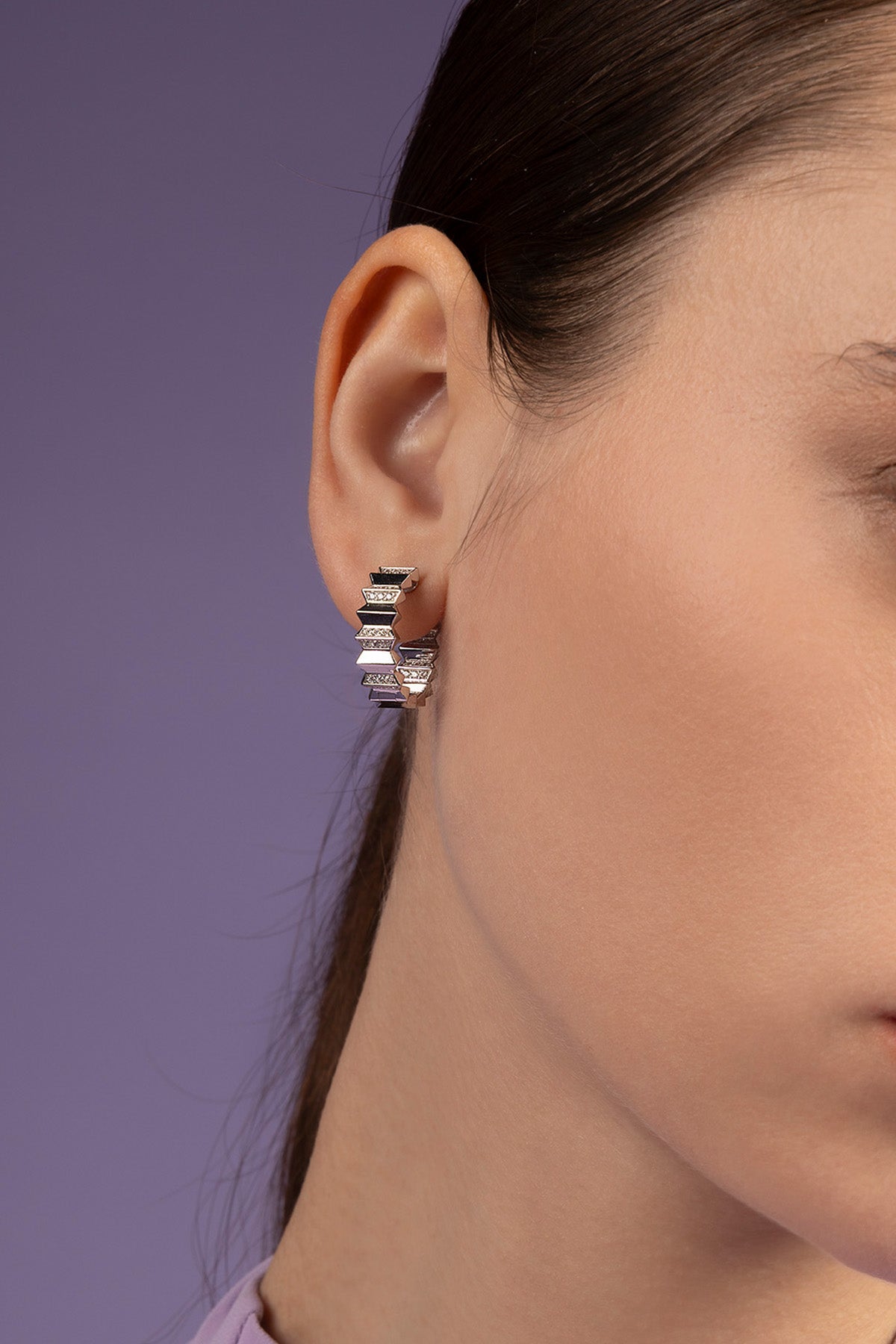 Pair of hoop earrings on a white background