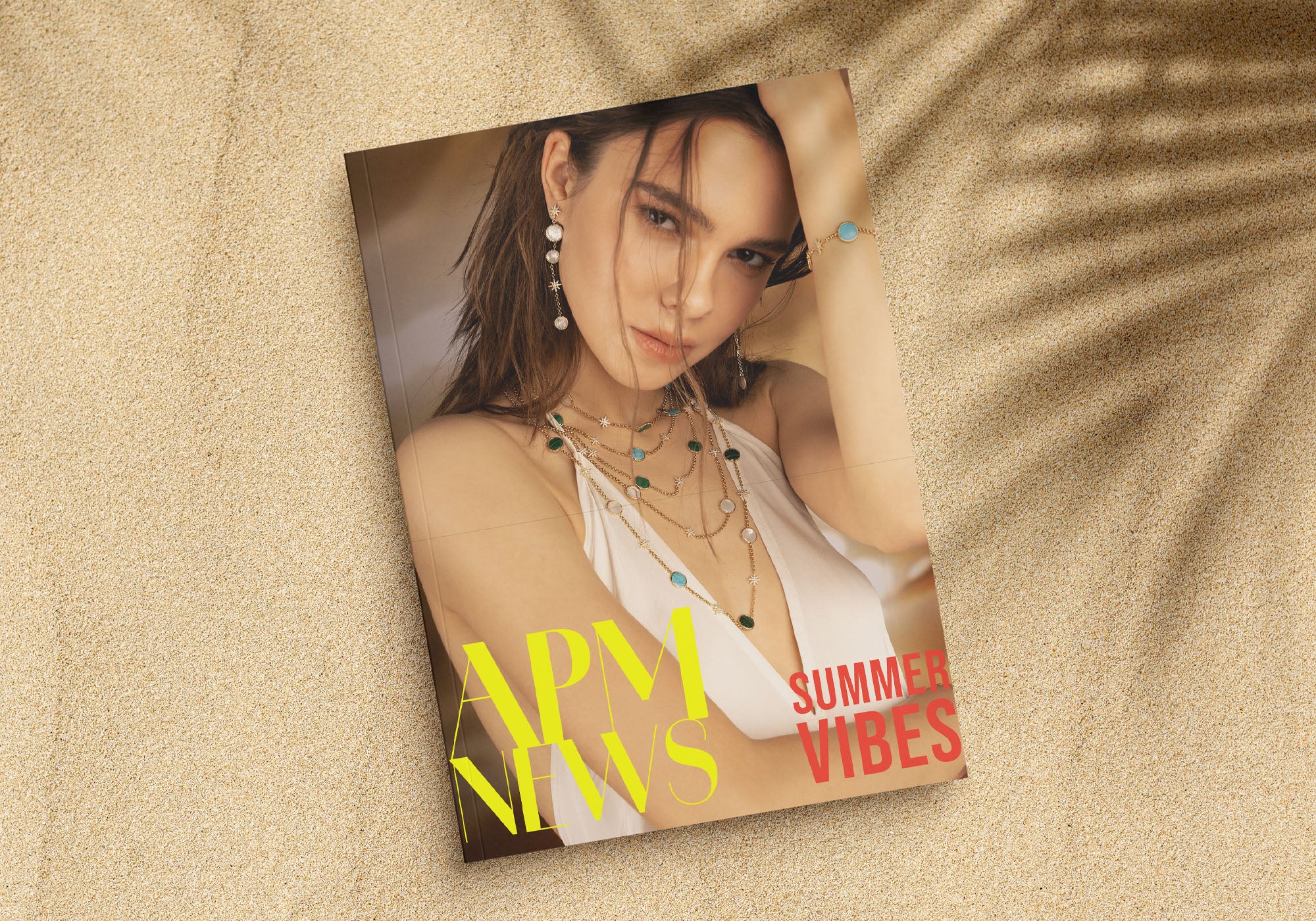 APM Monaco Magazine cover with a woman wearing Météorites jewelry set