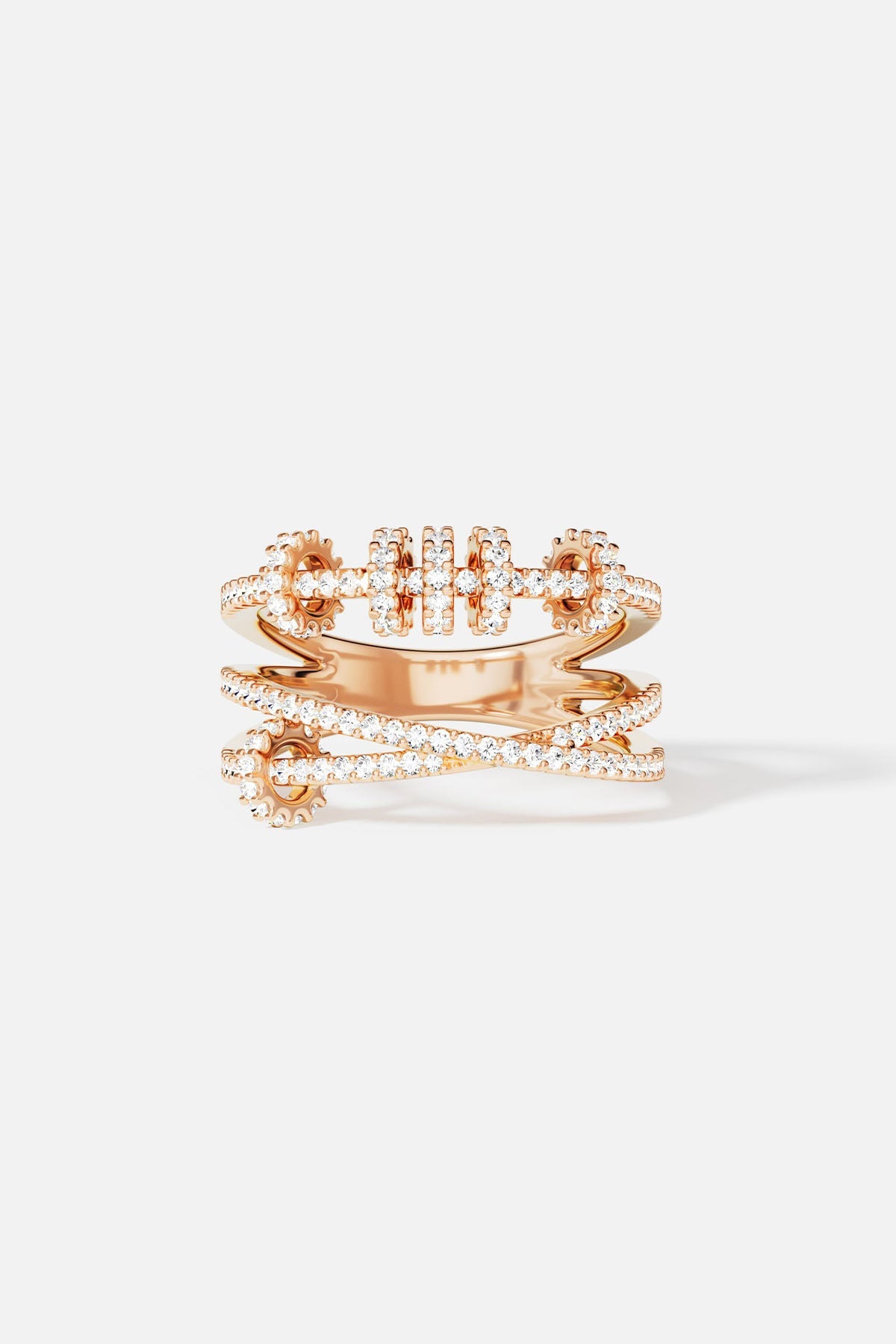 Rings APM Monaco rose gold triple ring with sliding hoops and pavé diamonds.