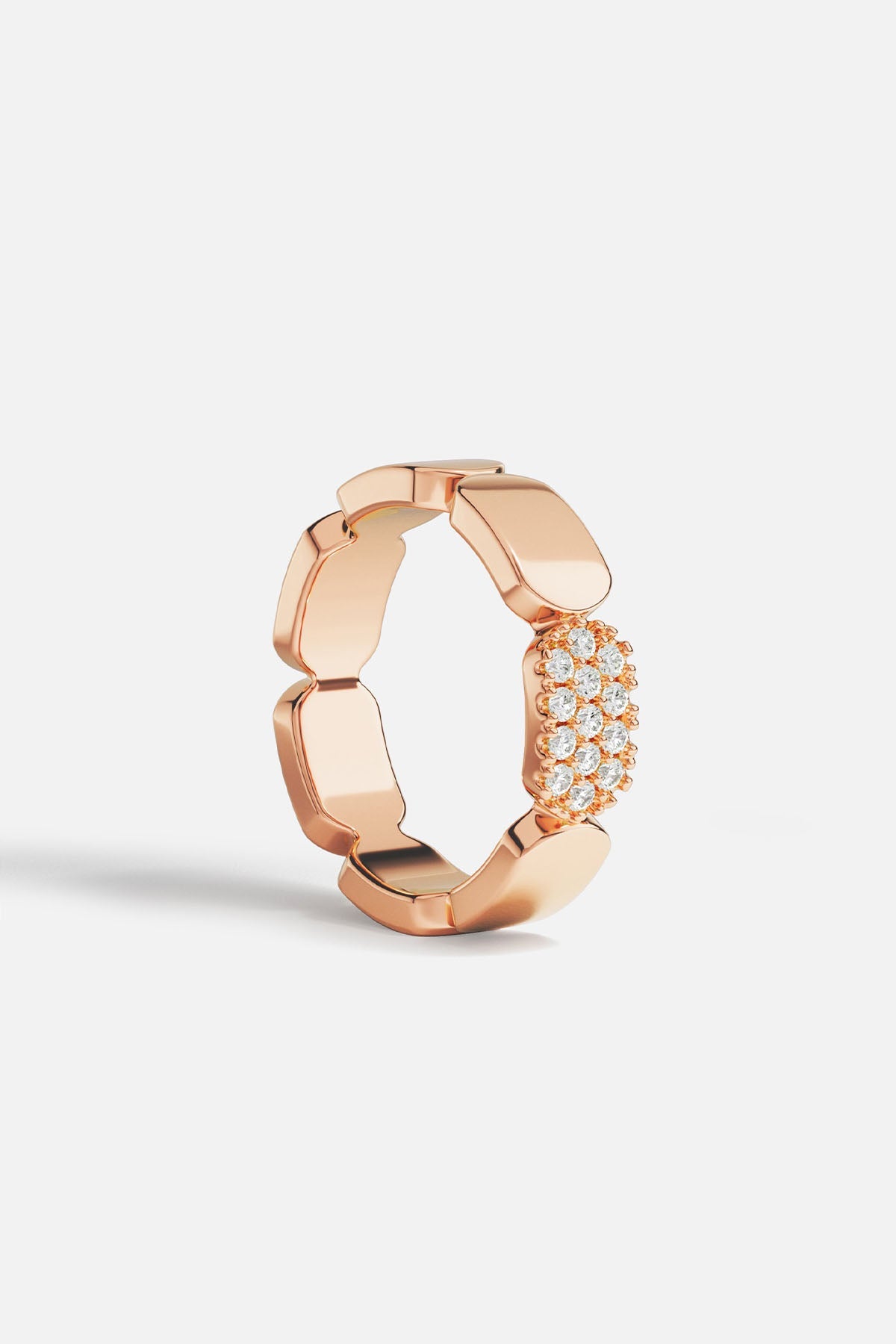 Rings APM Monaco dainty rose gold ring with small stones.