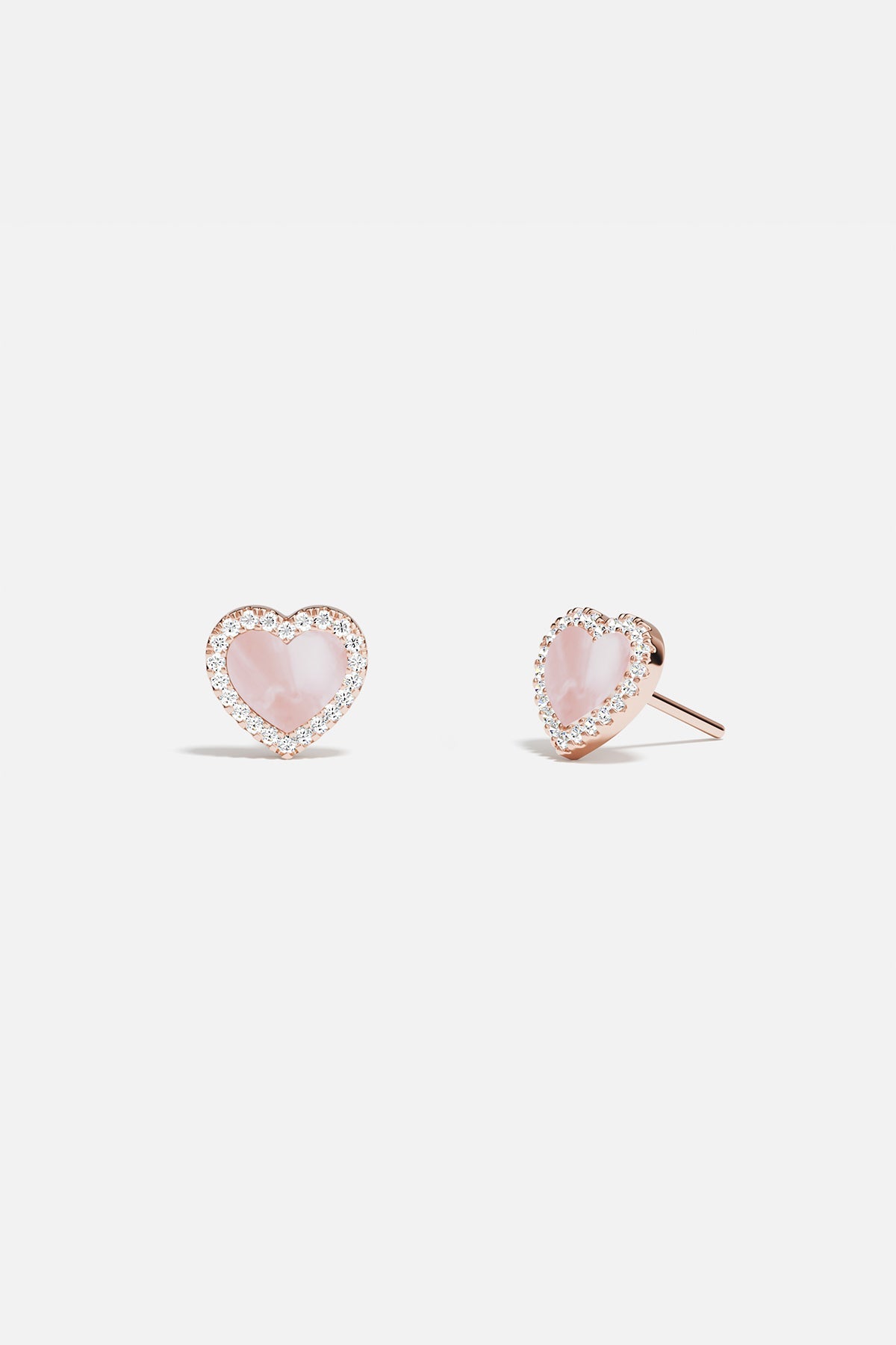 Earrings APM Monaco rose gold heart-stud with pink nacre.