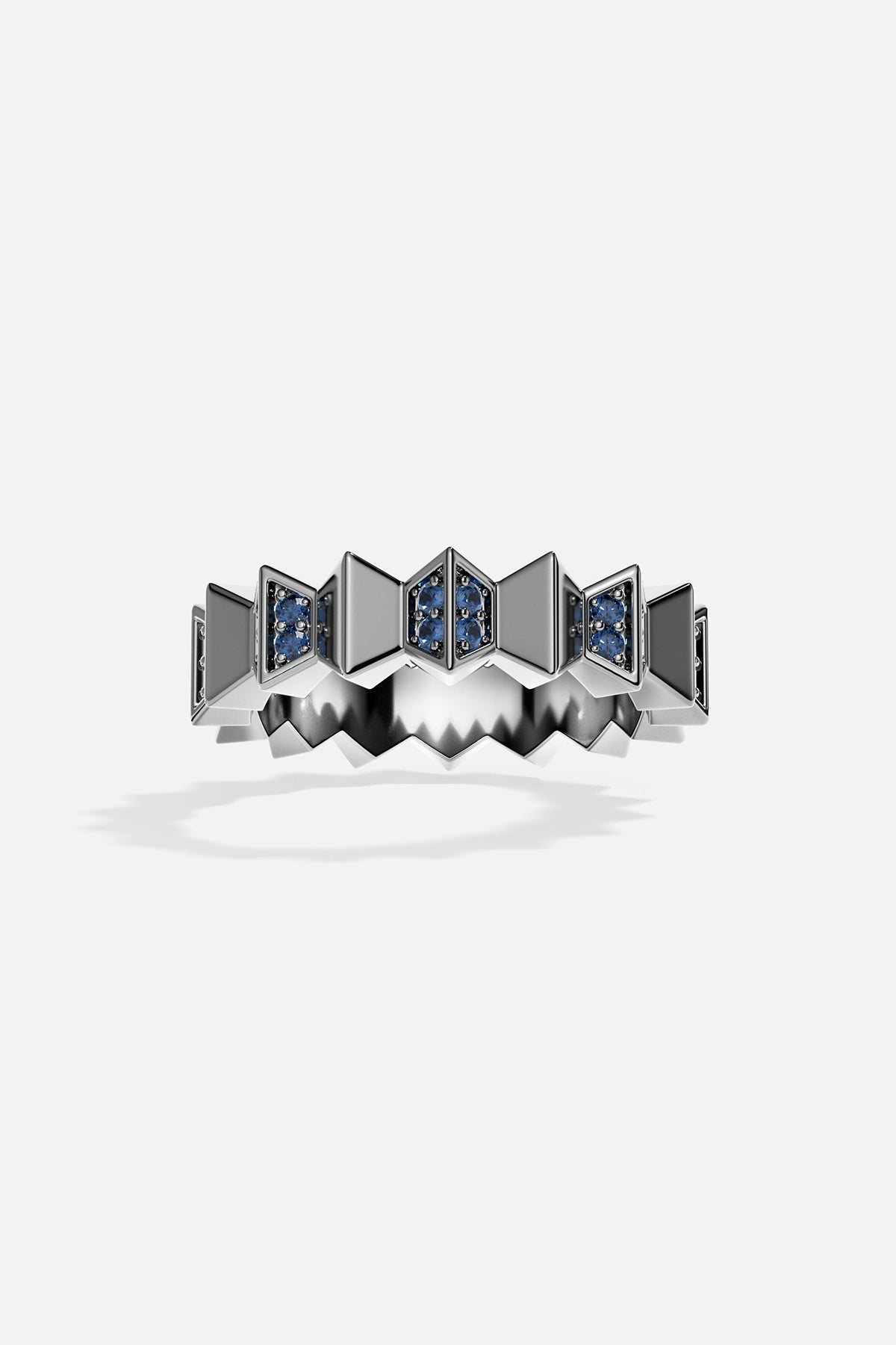Silver-tone ring with blue stones on a white background