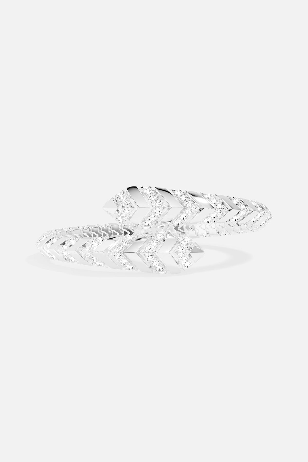 Silver ton bangle on a gray background