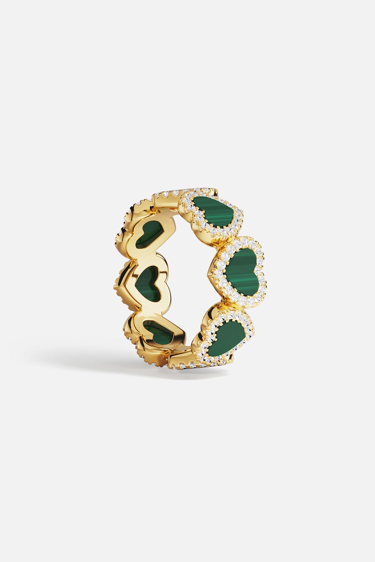 Rings APM Monaco, yellow gold ring featuring malachite-green heart shapes, each outlined with clear stones.