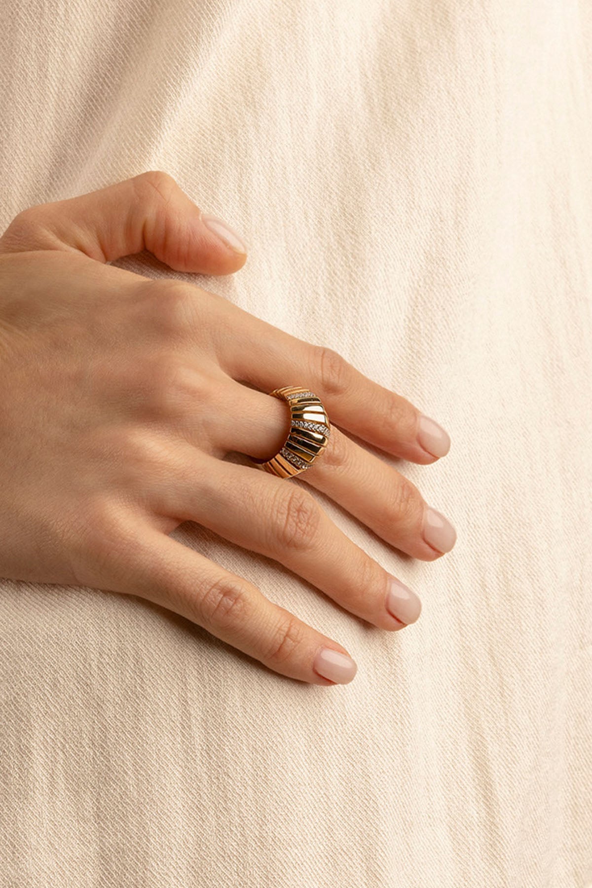 APM Monaco Rayon de Soleil Ring in Yellow Gold worn on hand