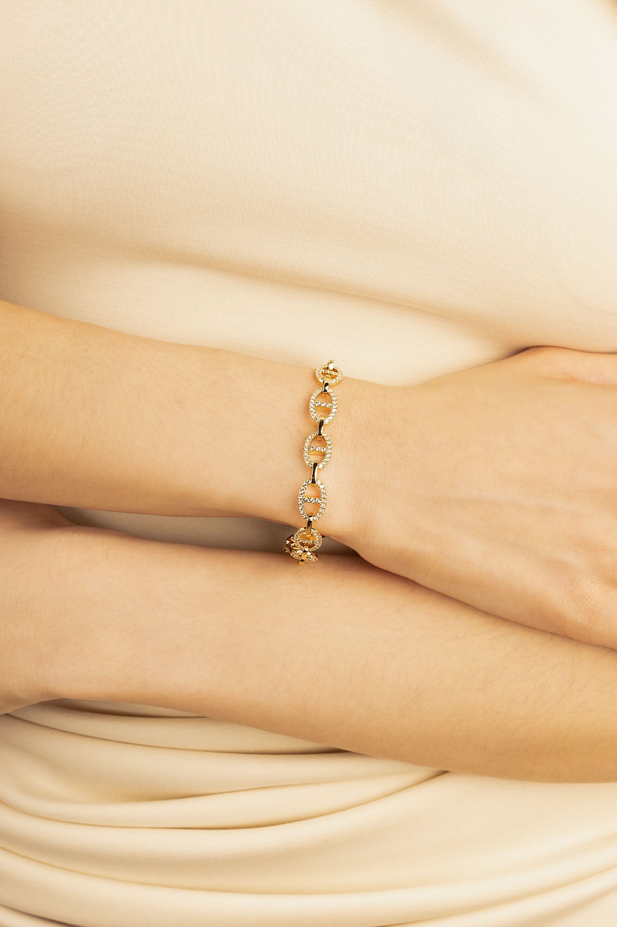 APM Monaco Maille Marine Chain Bracelet in Yellow Gold worn on hand