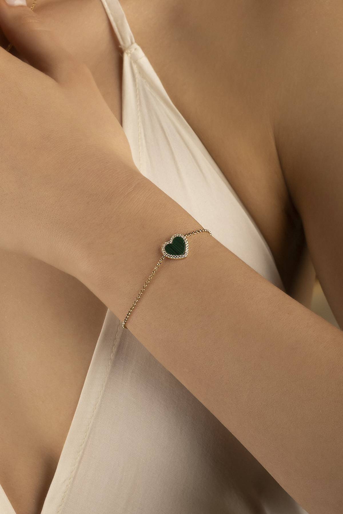 APM Monaco Bracelet in yellow gold worn on model