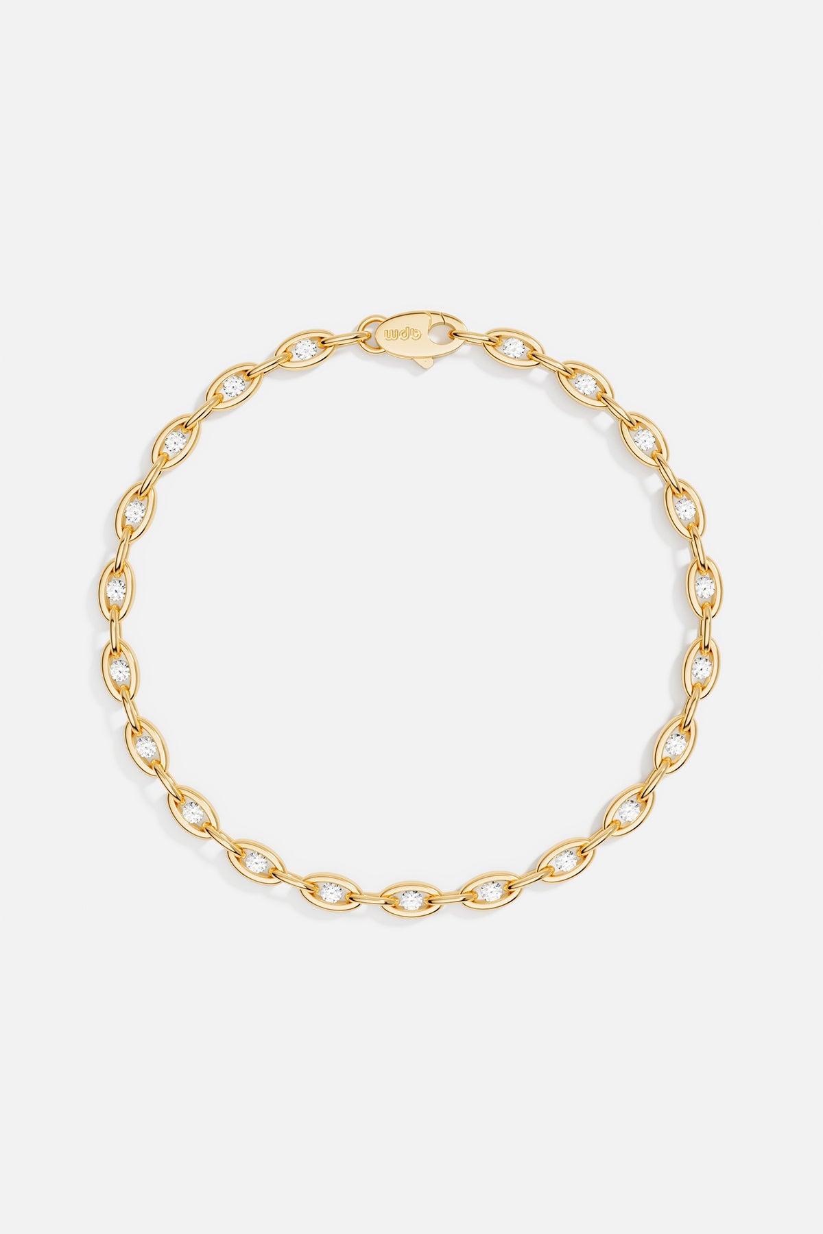 Bracelets APM Monaco, yellow gold pavé chain bracelet with small diamonds between each oval link.