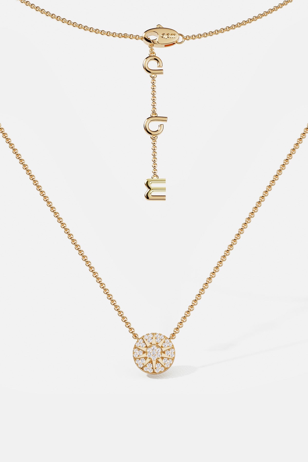 Necklaces APM Monaco: yellow gold chain necklace with a circular white diamond pendant.