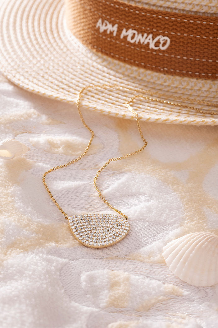 APM Monaco Pavé Galet Adjustable Necklace in Yellow Gold on soft blanket