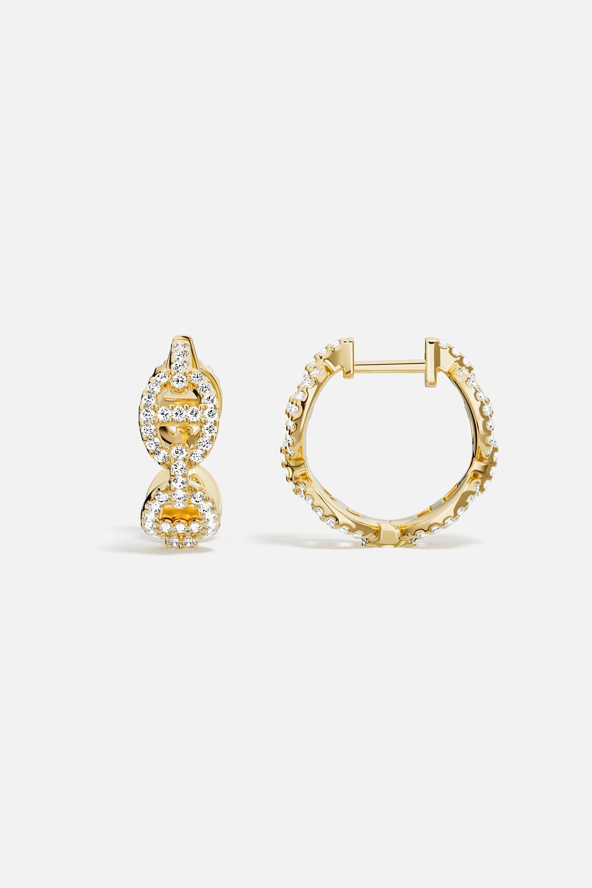 Earrings APM Monaco yellow gold maille marine hoop with white cubic zirconia.