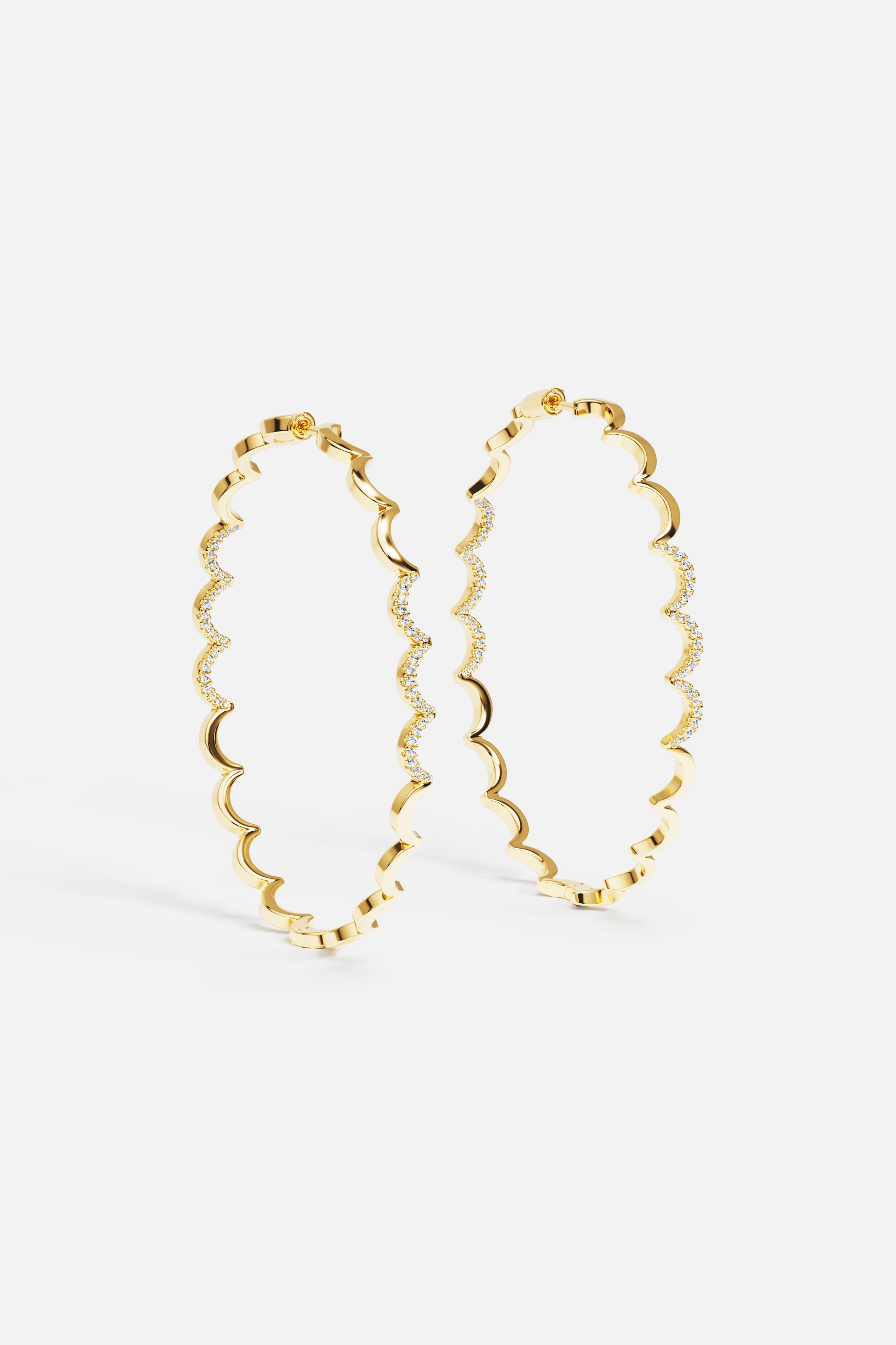 Earrings APM Monaco, yellow gold hoop with a wavy zigzag design and diamonds, large size.