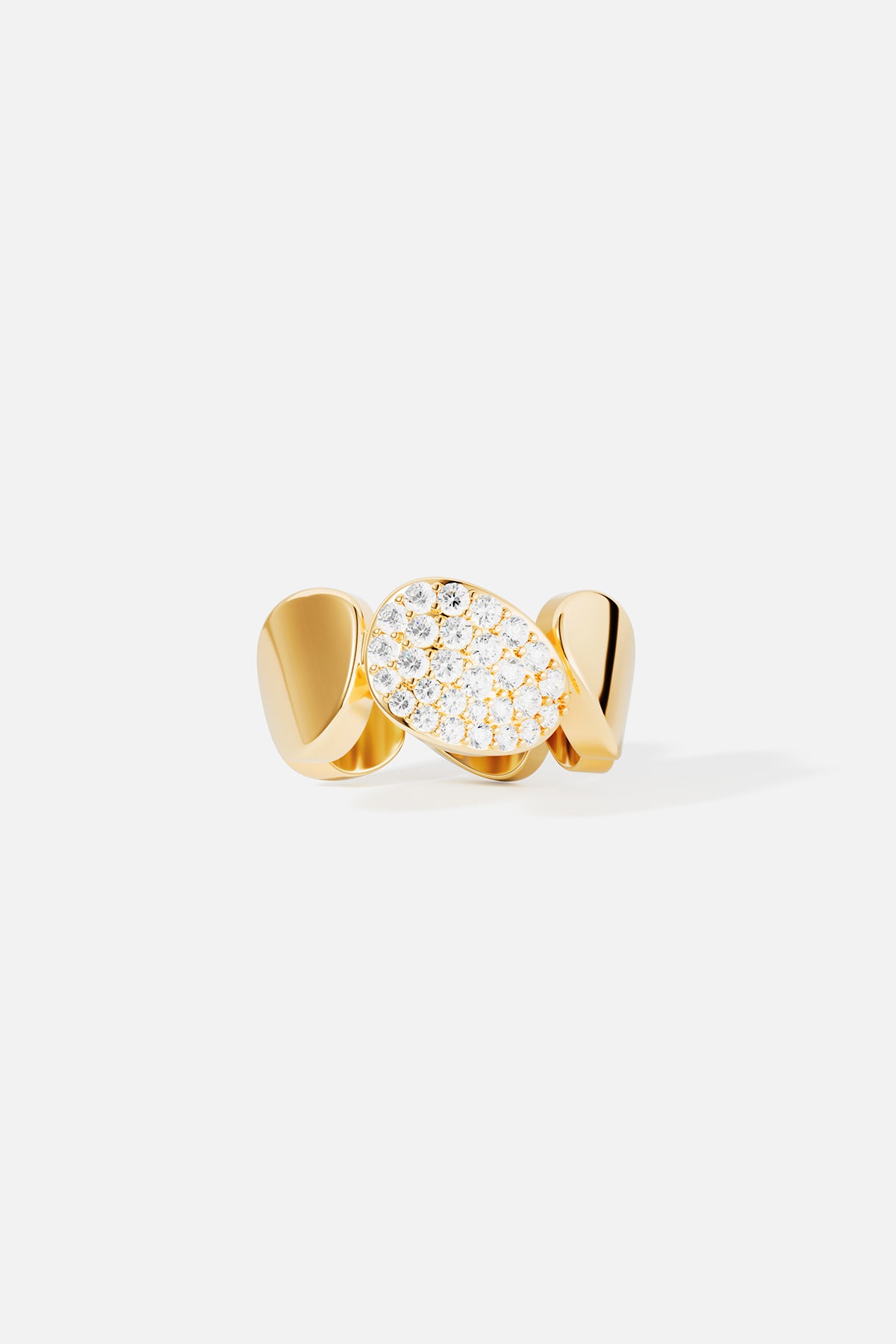 Gold-plated ring with pavé details on a light gray background