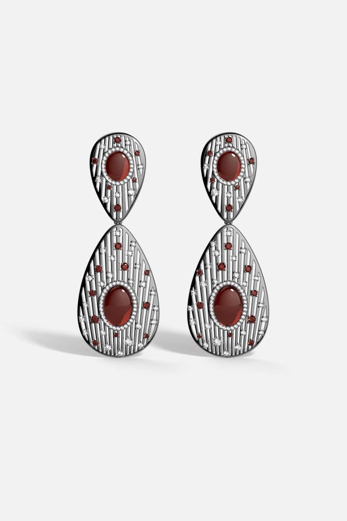 APM Monaco drop earrings, deep red cabochons and starlit sparkle, boldly poetic.