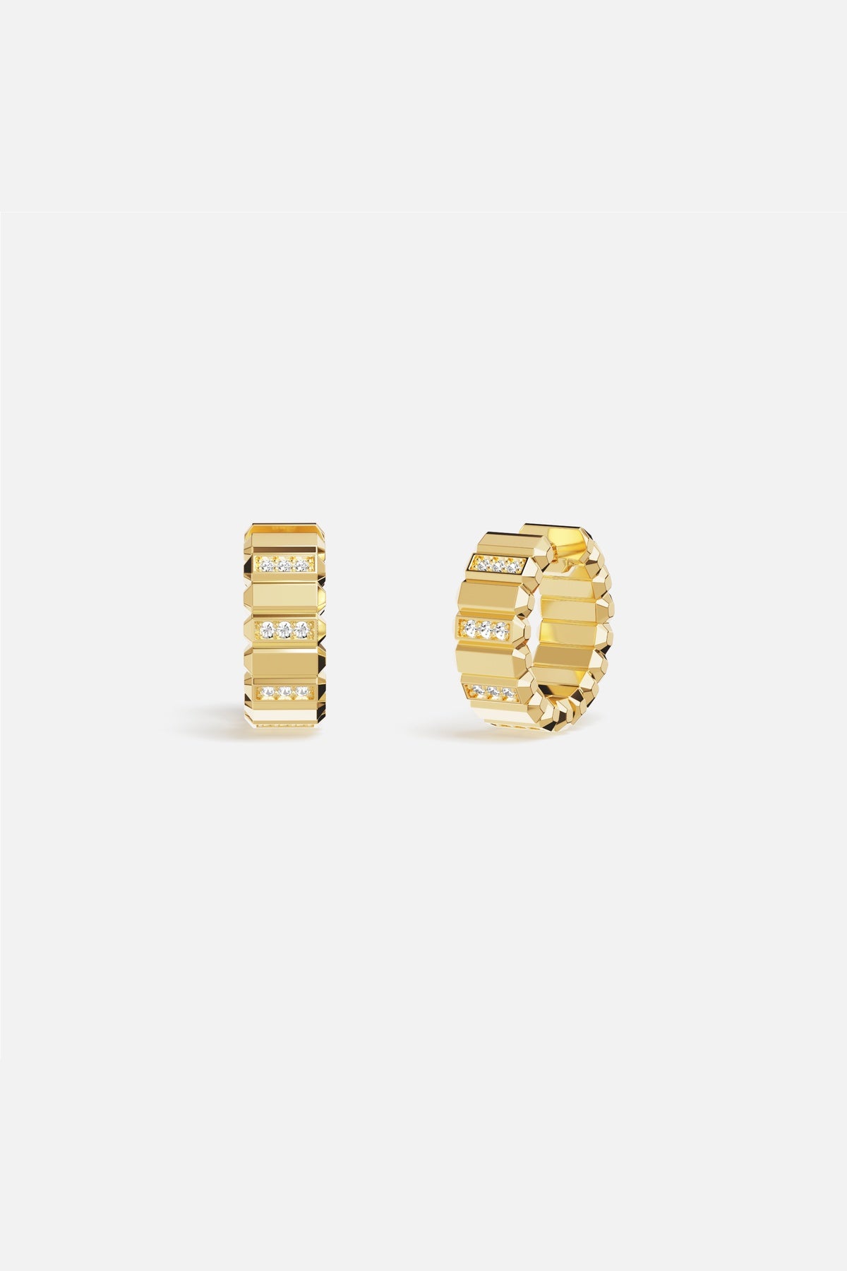 APM Hoop Earrings in golden color, faceted brilliance with a bold modern edge.