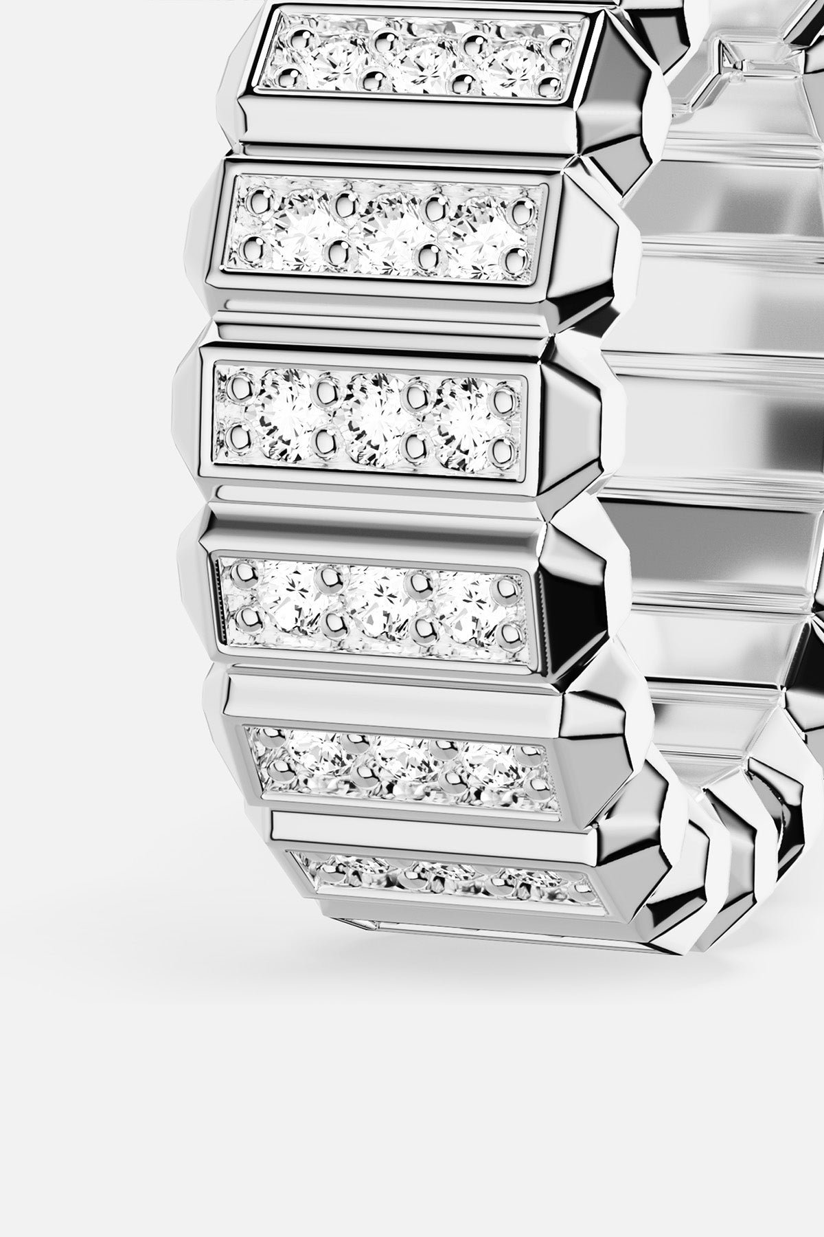 APM Ring in rhodium finish, sculpted facets and pavé brilliance for bold modern allure.