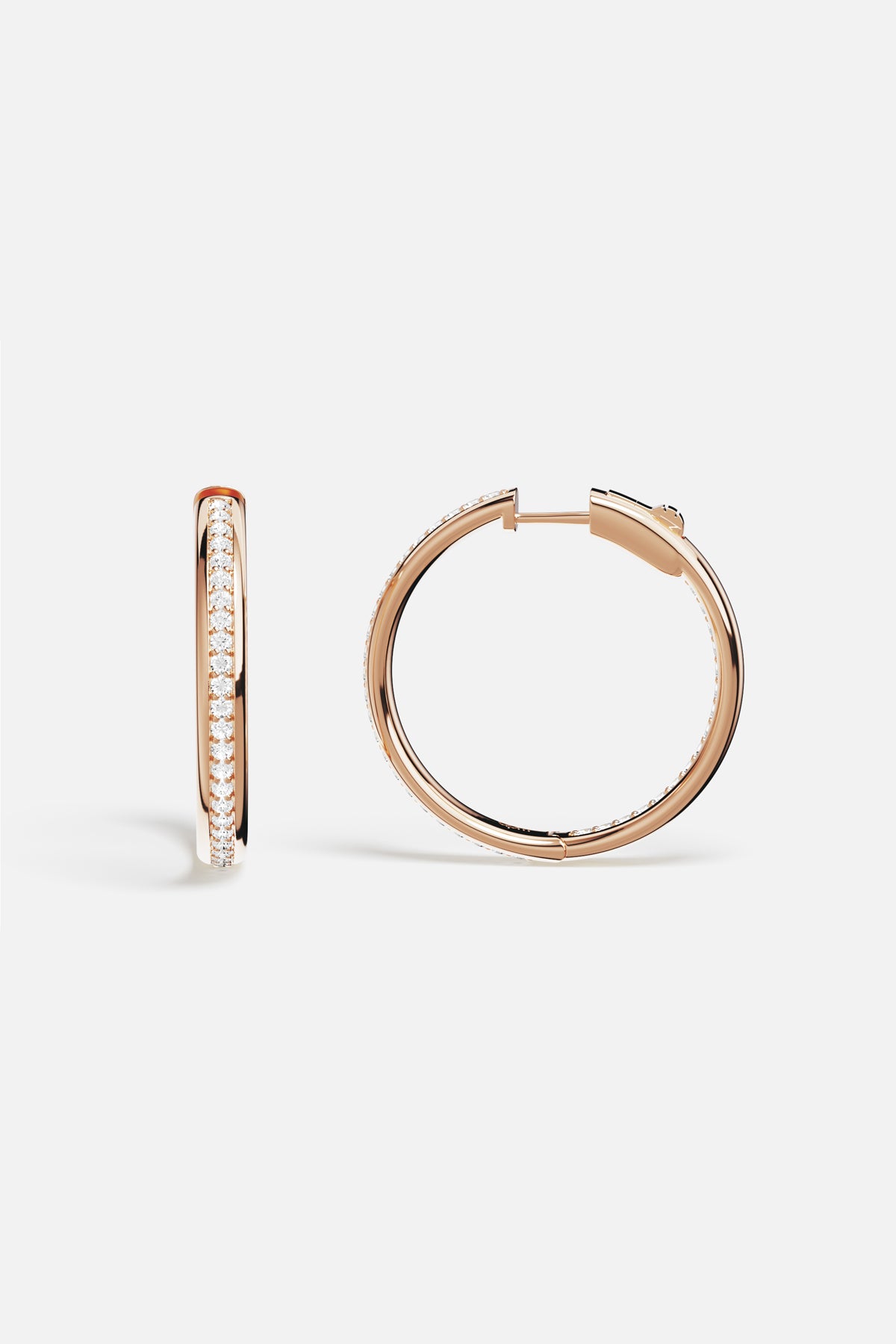 APM Hoop Earrings in rose color, luminous elegance with a modern glow.