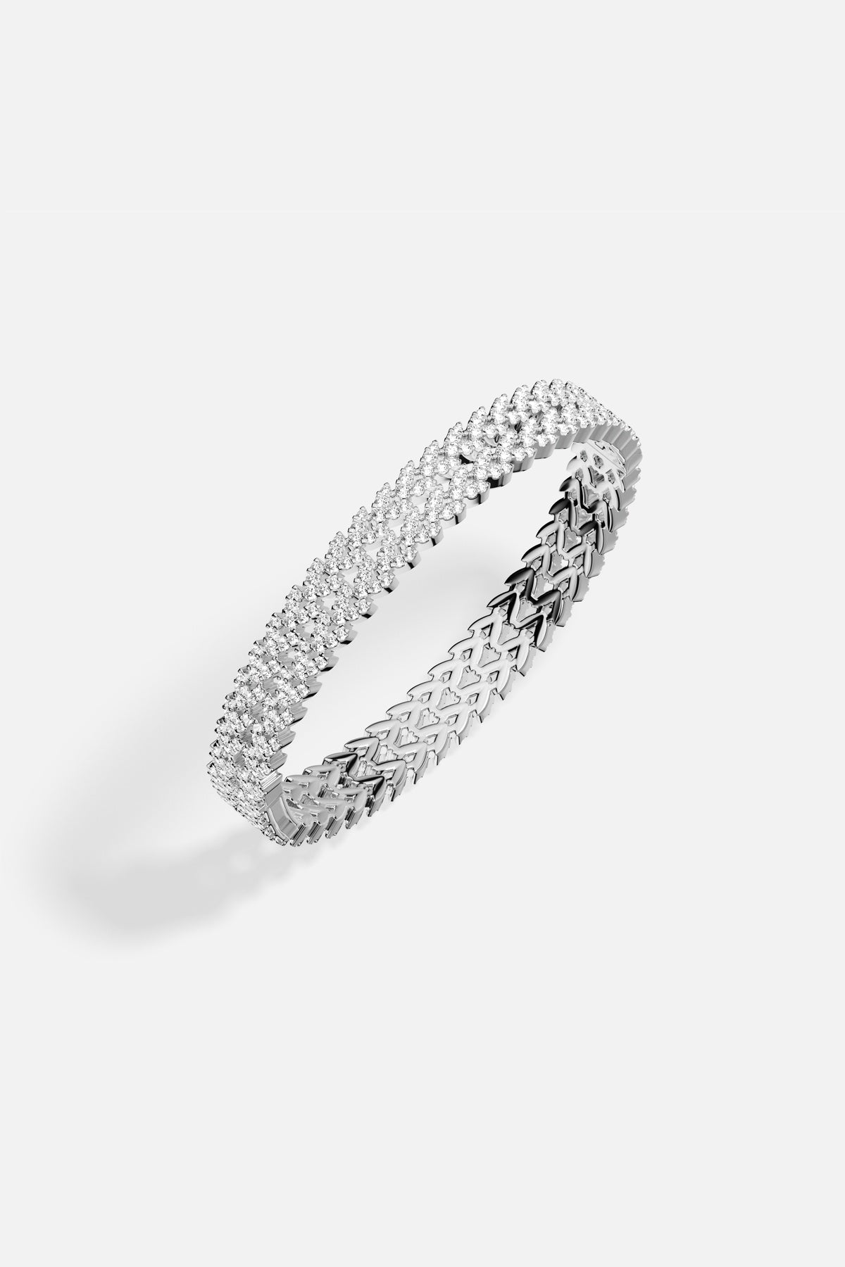 APM Bracelet in rhodium finish, a sparkling embrace of modern elegance.