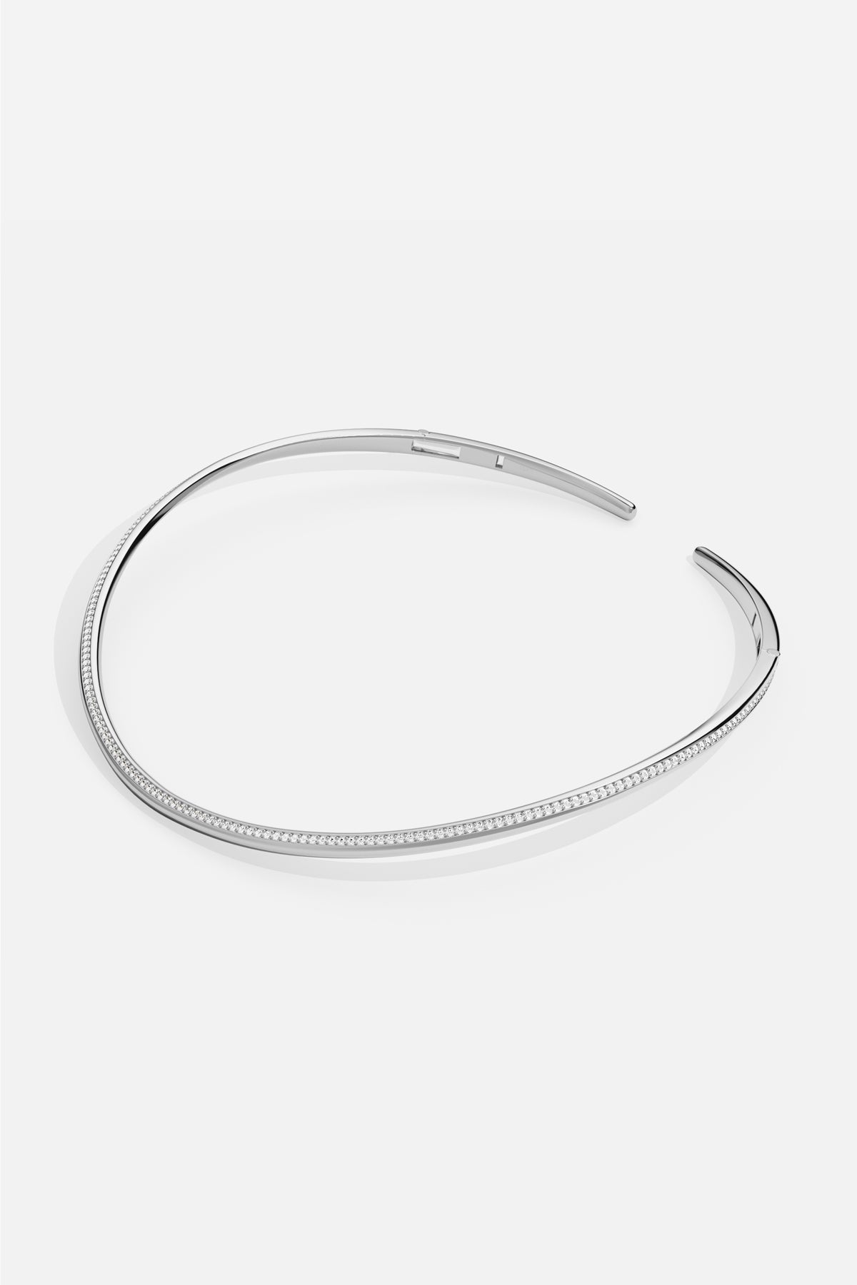 APM Choker Necklace, a fluid rhodium finish curve tracing effortless modern elegance.