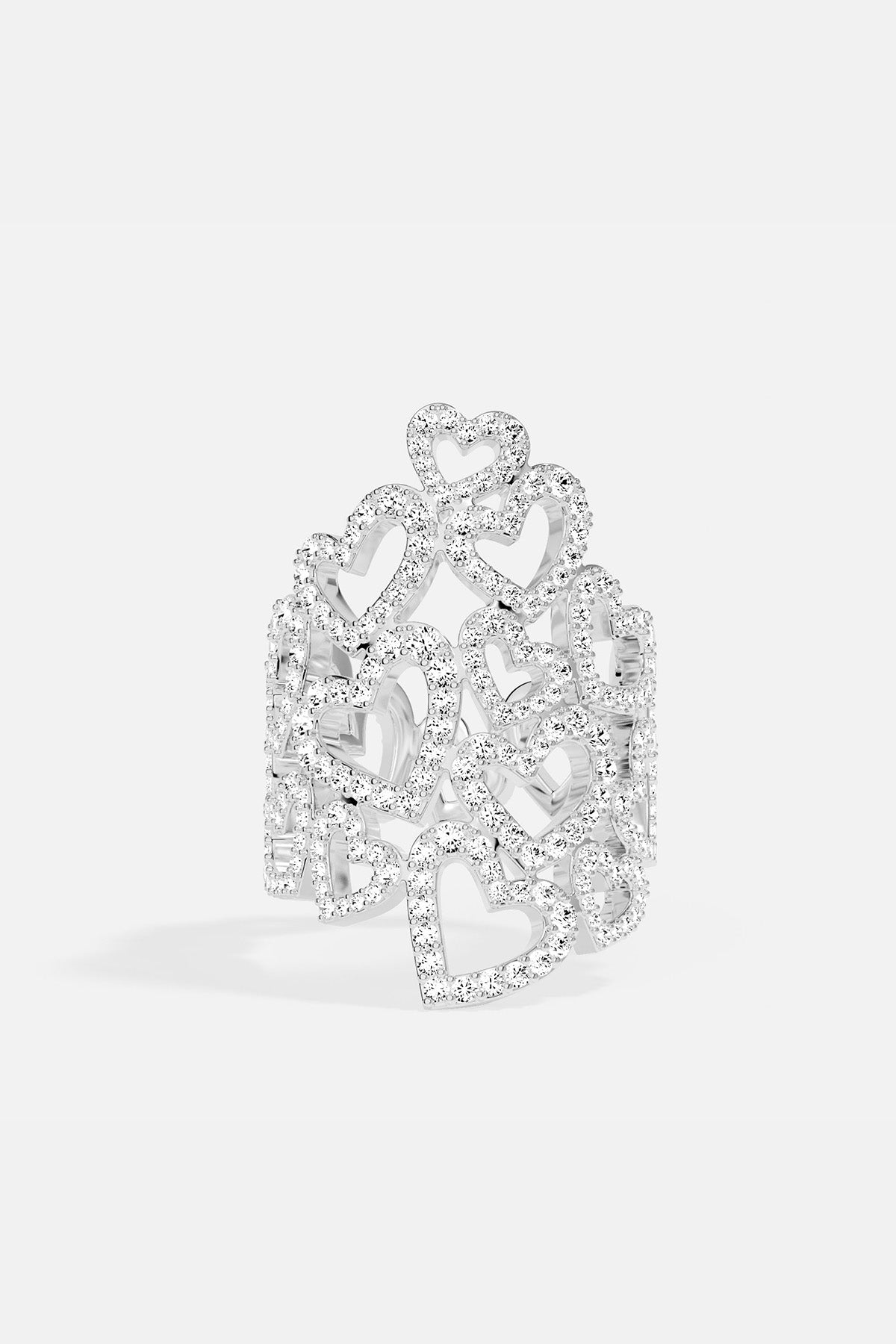 APM MONACO heart-shaped silver earring on a white background