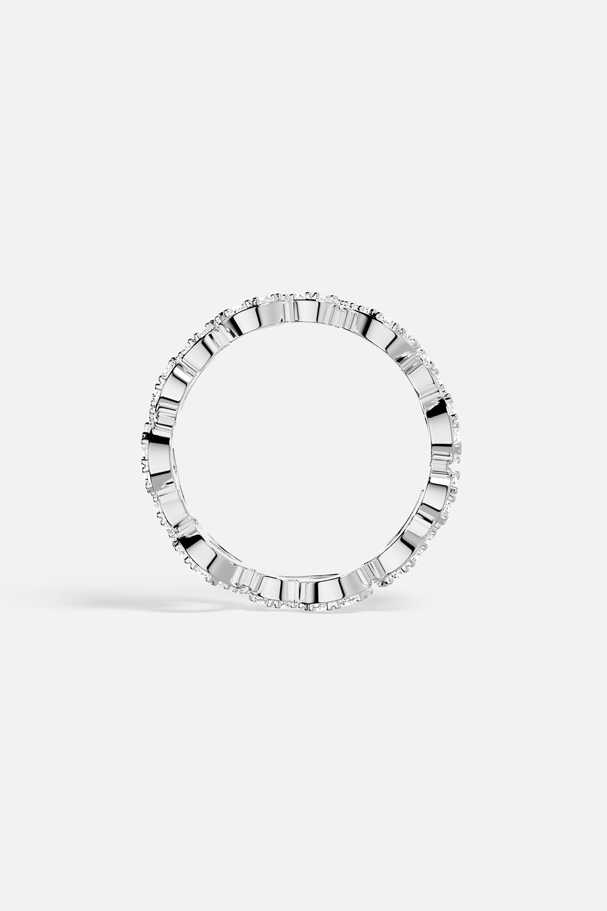 APM MONACO ring in silver with heart-shaped design on a white background