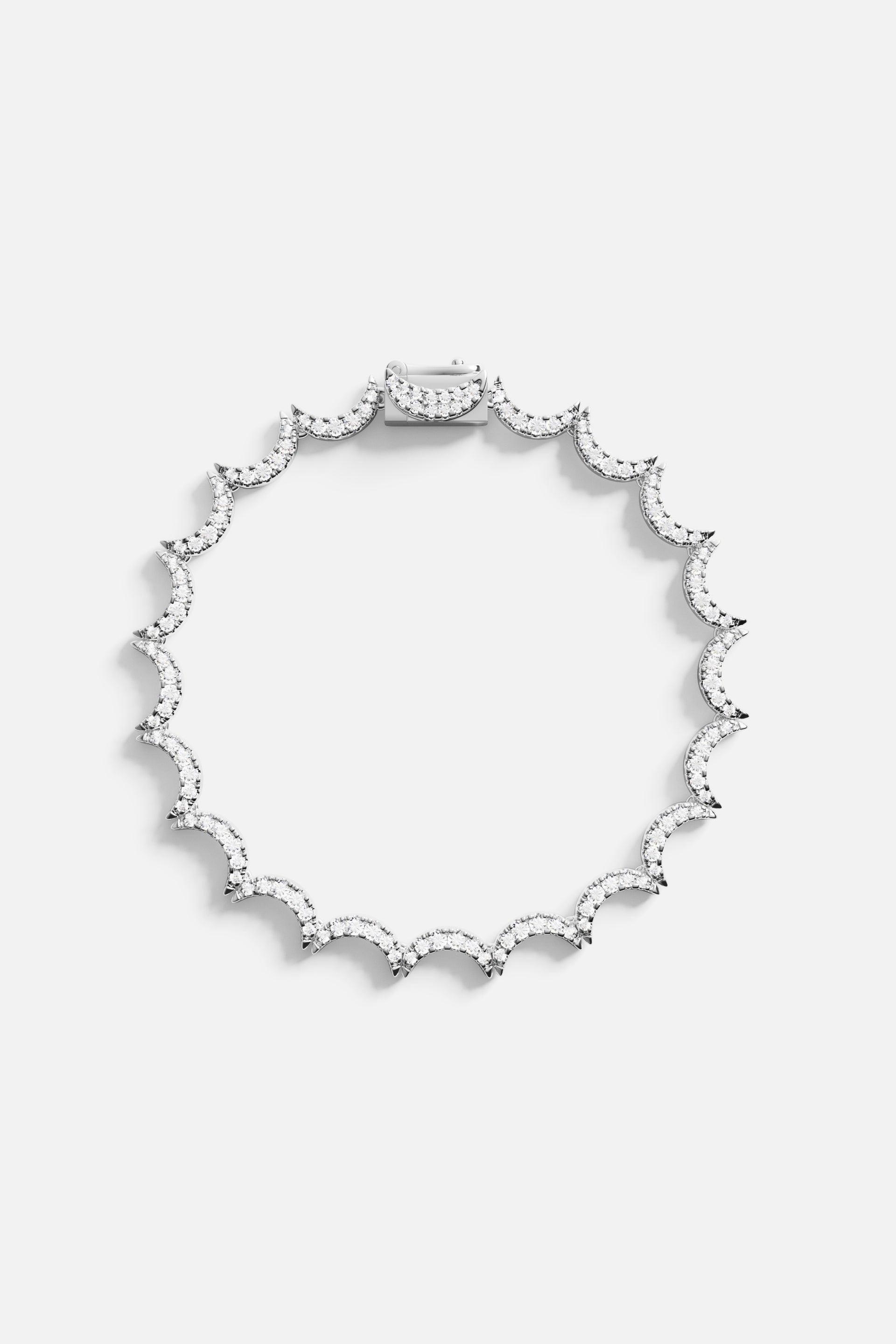Bracelets APM Monaco silver-tone wavy bracelet with a white gem accent.