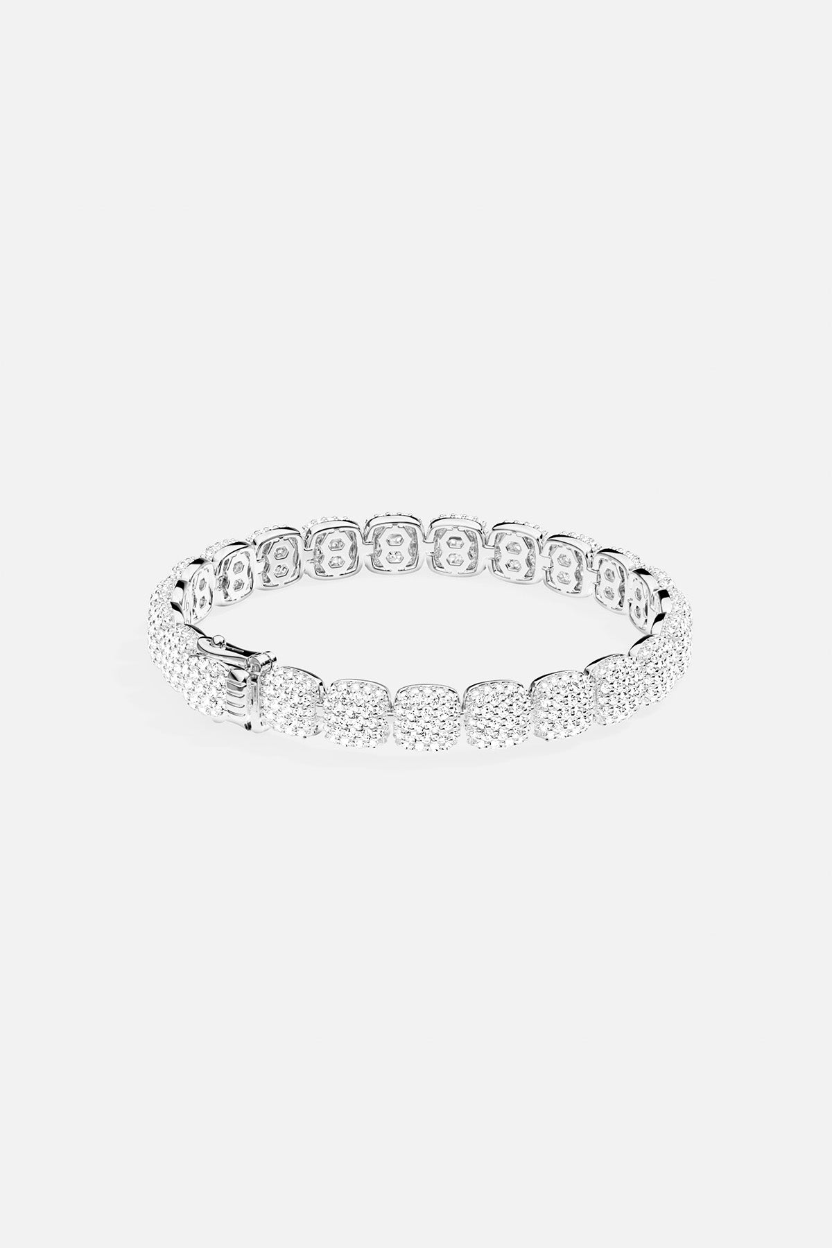 APM MONACO pave bracelet in silver with full small white stones on a light gray background