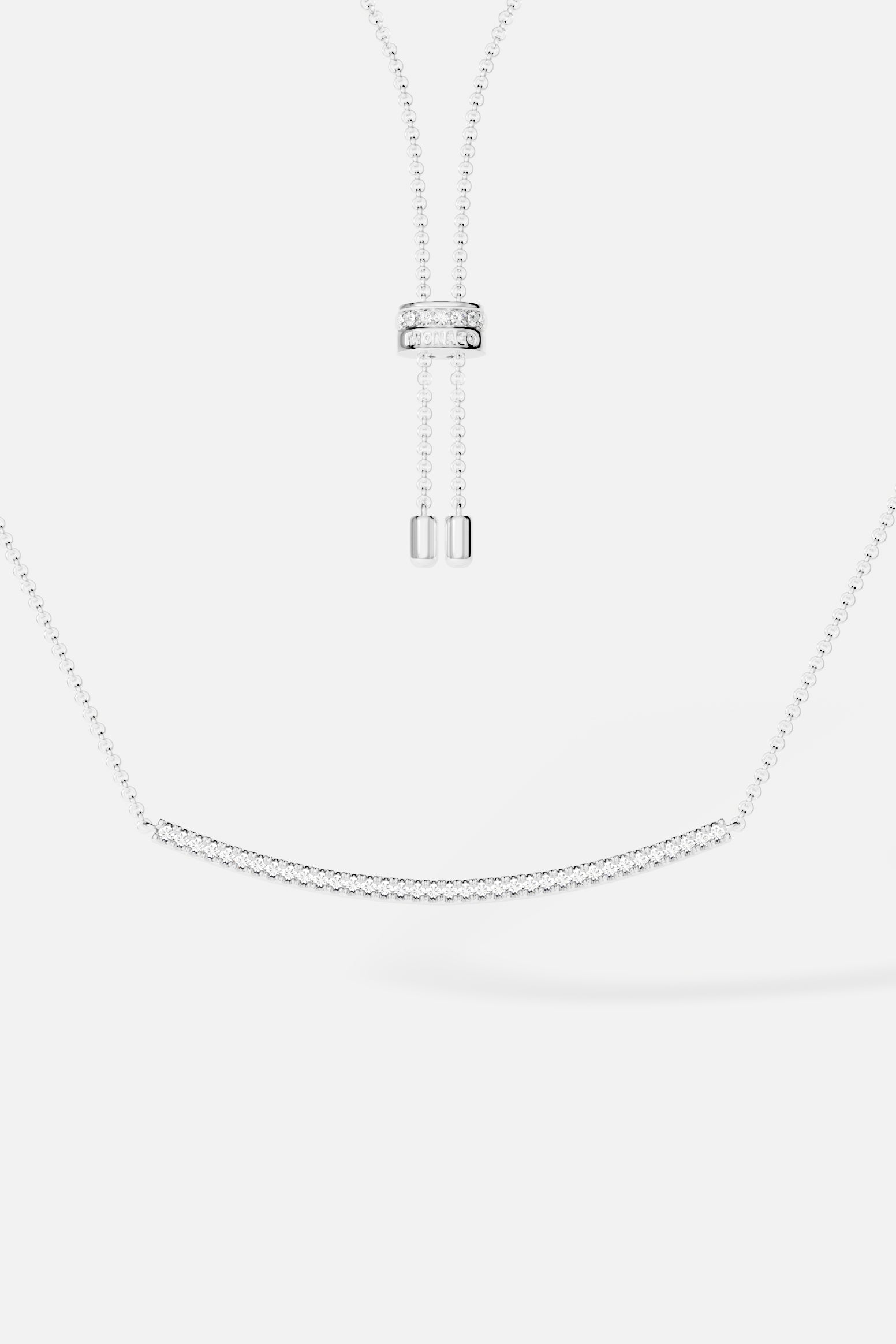 Necklaces APM Monaco, white tone, adjustable necklace with a pave-arched diamond-encrusted pendant.