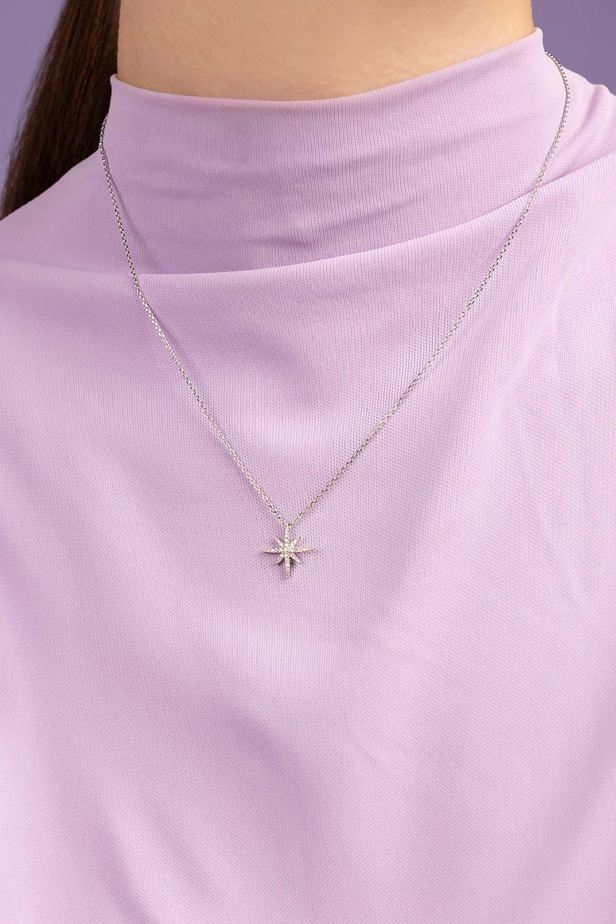 APM Monaco Meteorites Adjustable Necklace worn on model with lilac background