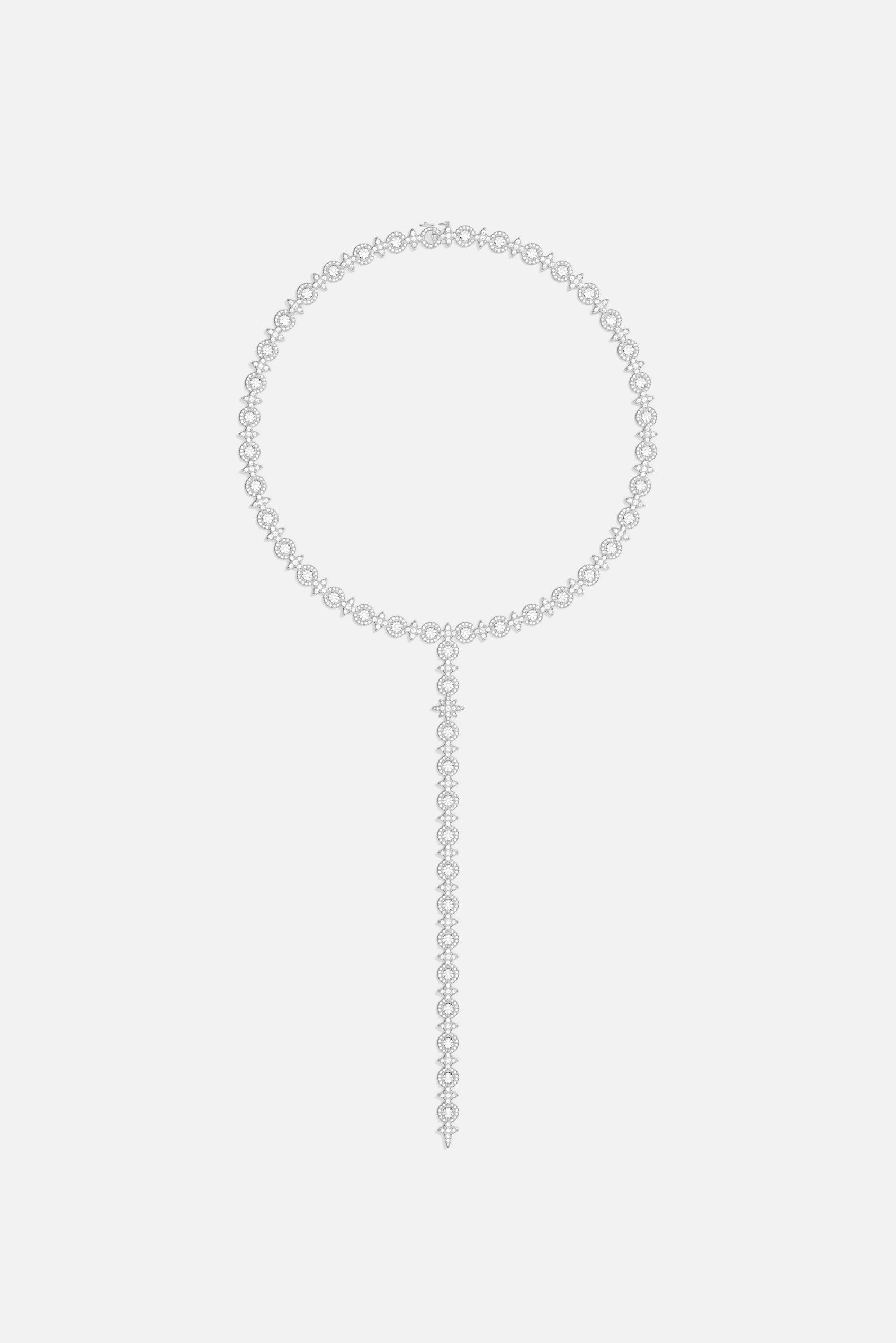 Necklaces APM Monaco. Silver-tone choker with circular link band and elongated strand featuring pavé circles and teardrop stones in a Y-drop design.