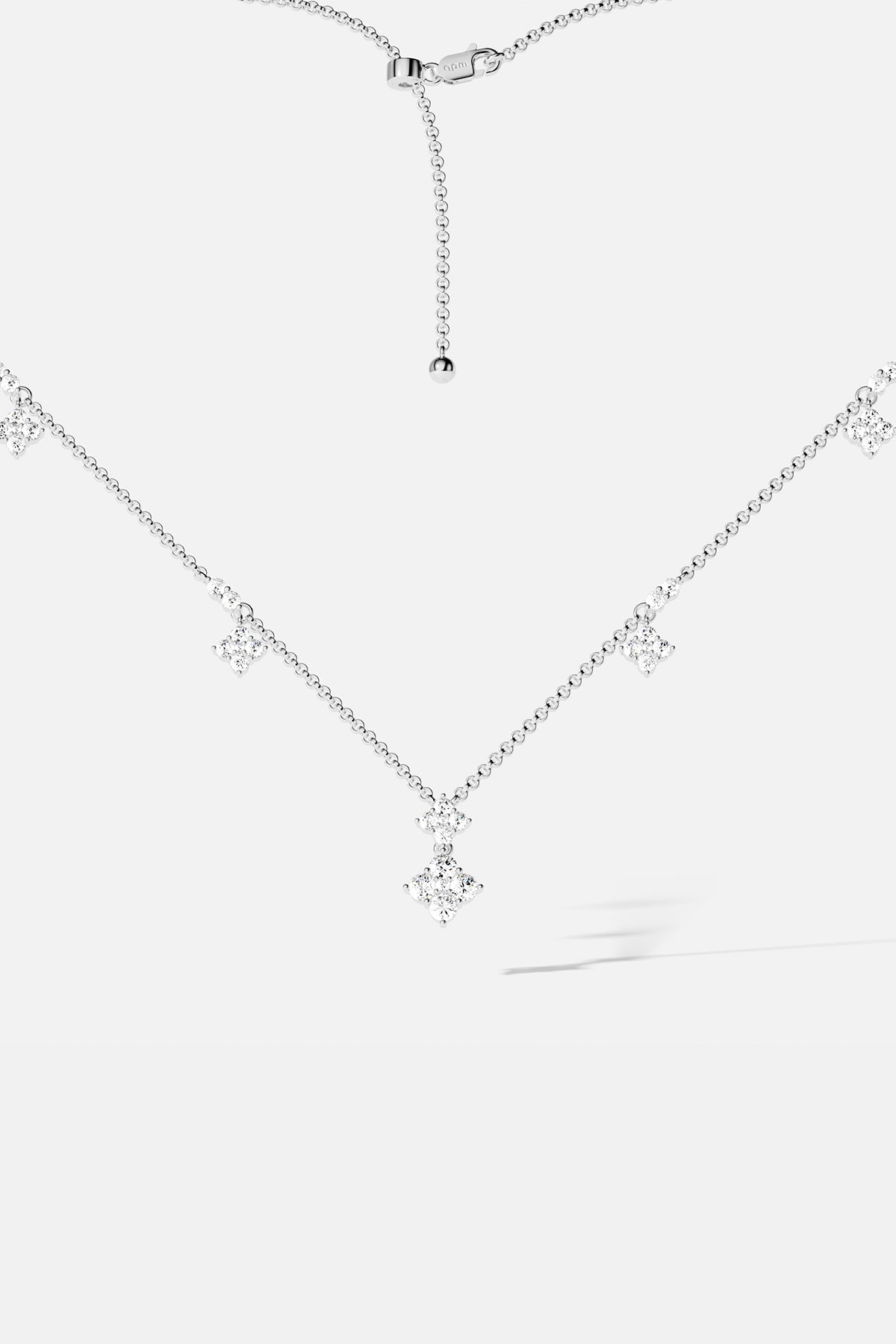 Necklaces APM Monaco adjustable spark necklace with a silver chain and White cubic zirconia pendant.