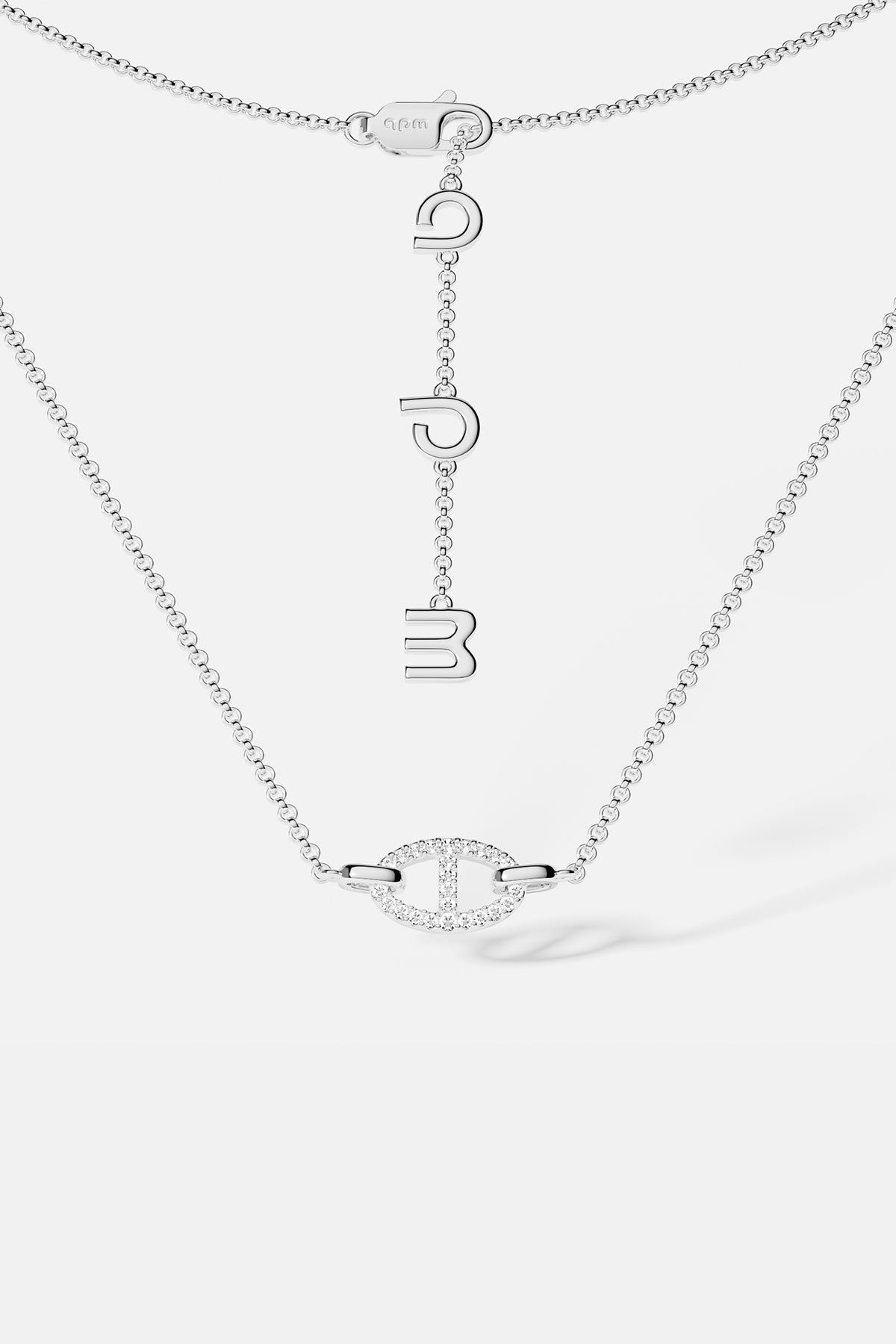 Necklaces APM Monaco, white tone, maille marine chain with a pendant of three hanging letters.